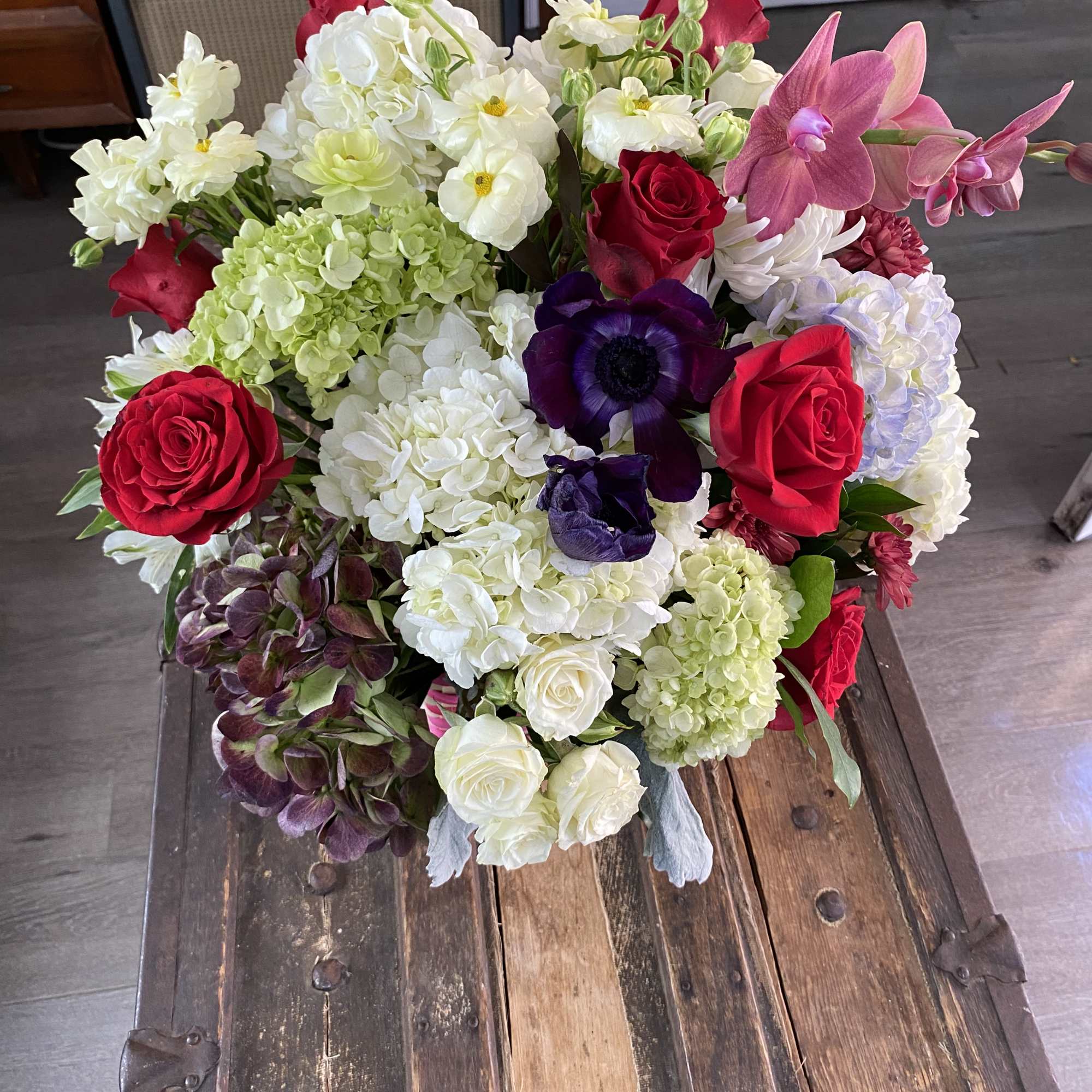 Mixed bouquet of red, white, pink, and purple flowers
