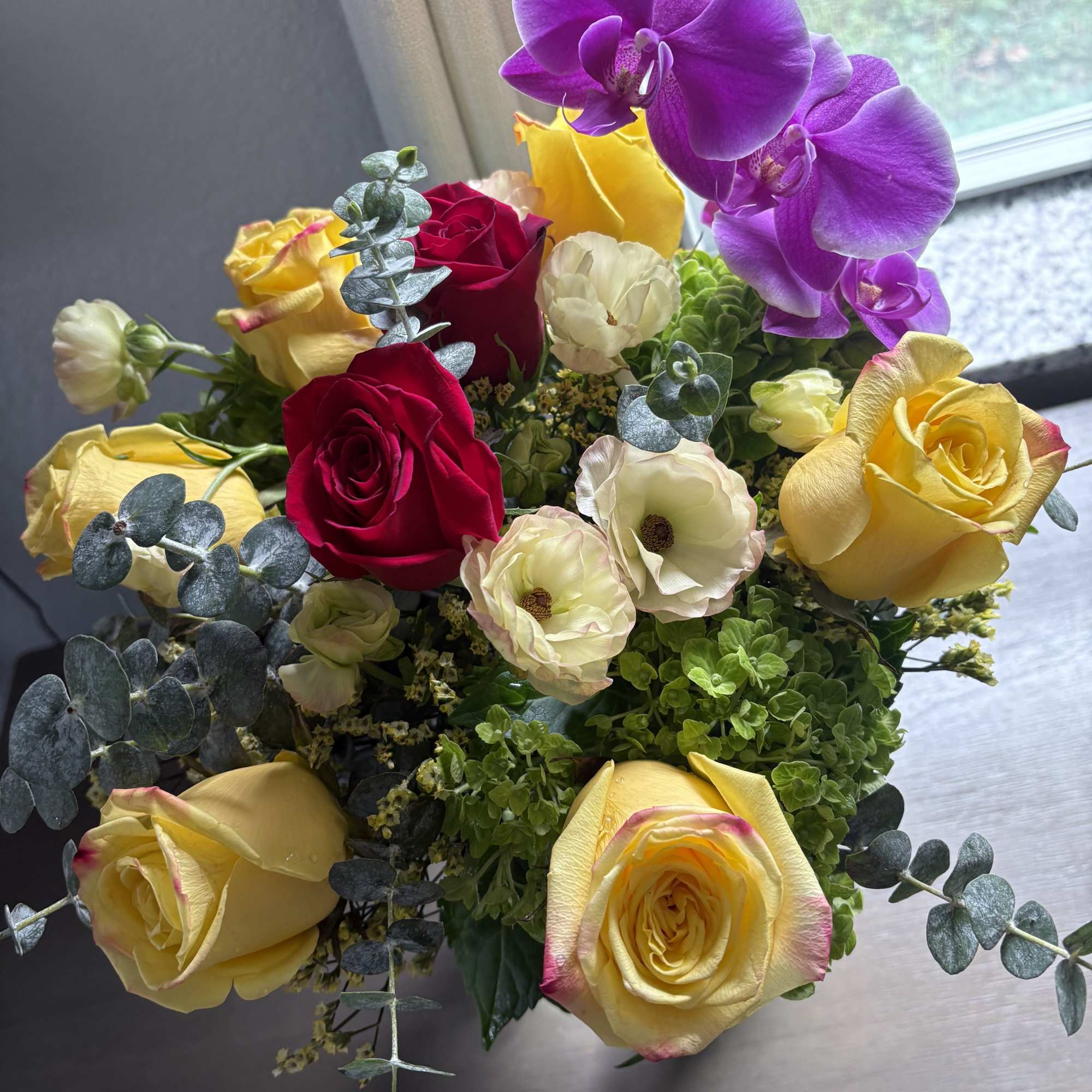 Bouquet of yellow and red roses with purple orchids, photo 2 of 2