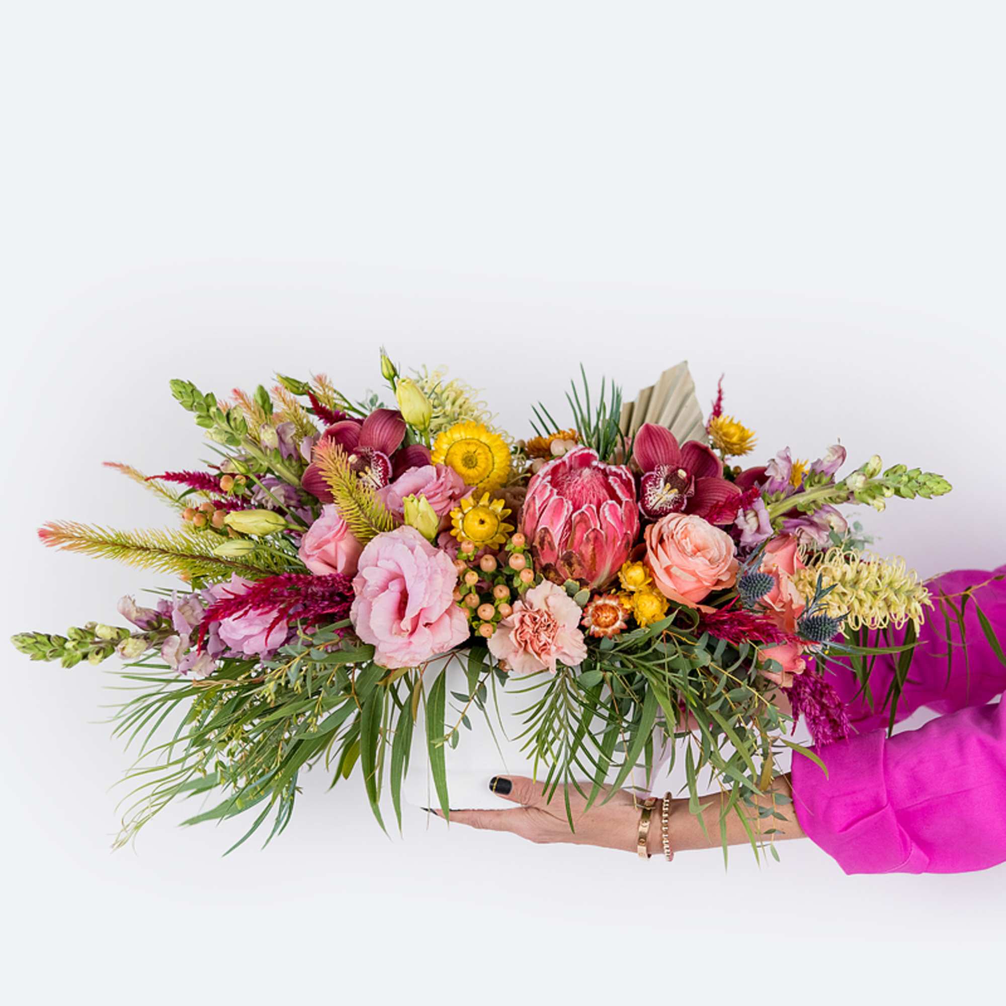 Our long and low arrangement features the best florals the season has, photo 3 of 4