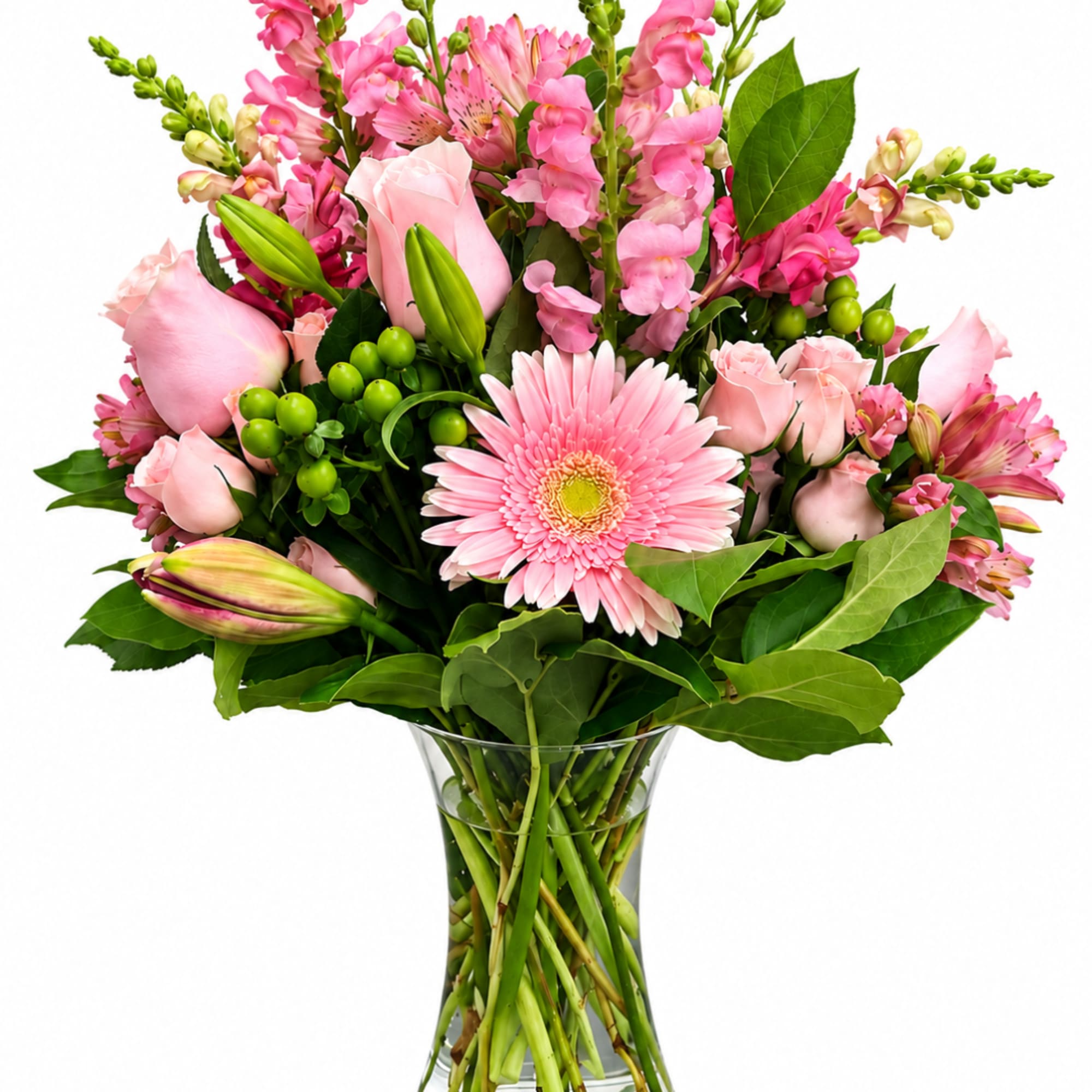Pink mixed bouquet in a clear glass vase