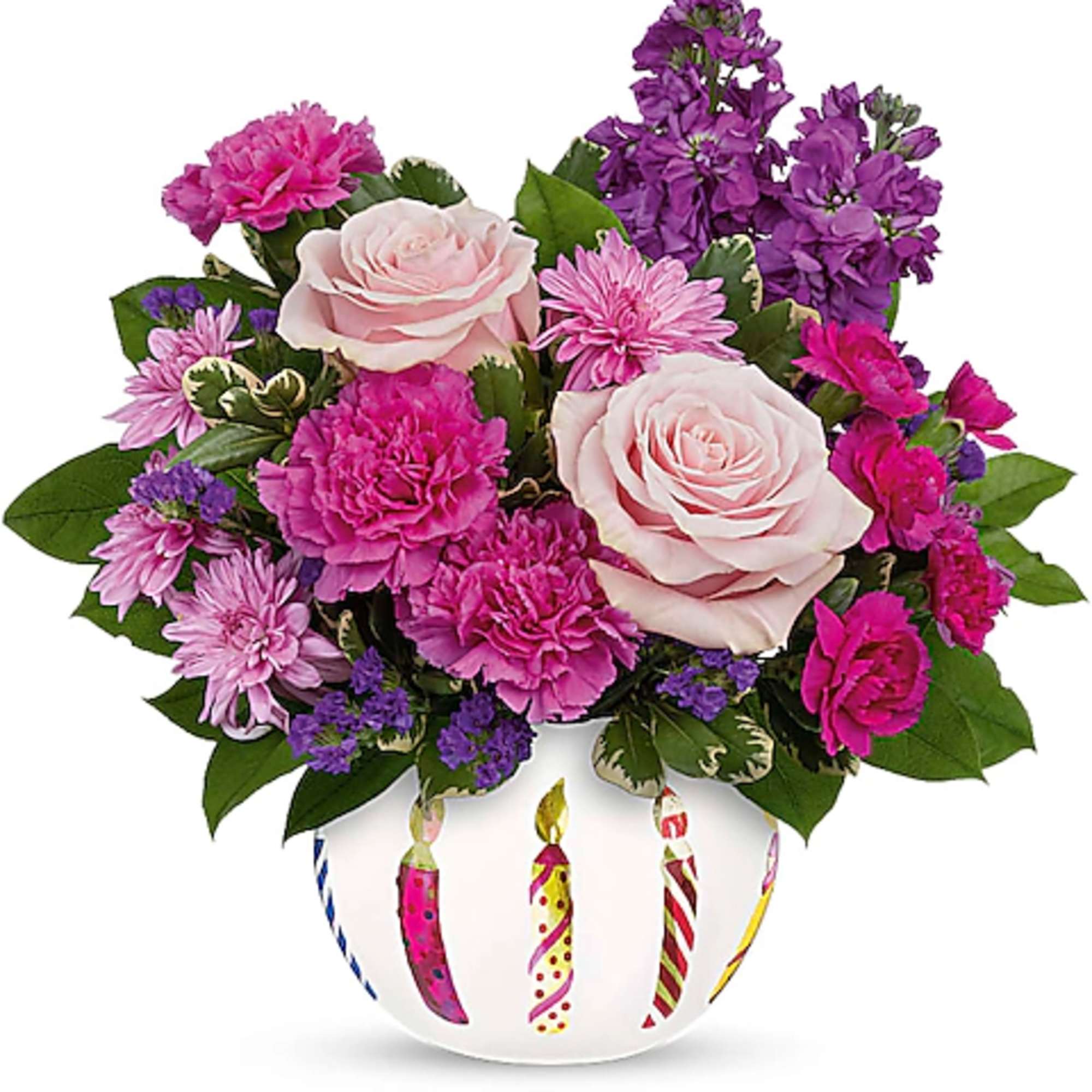Pink and purple flower arrangement in a white vase with candle designs