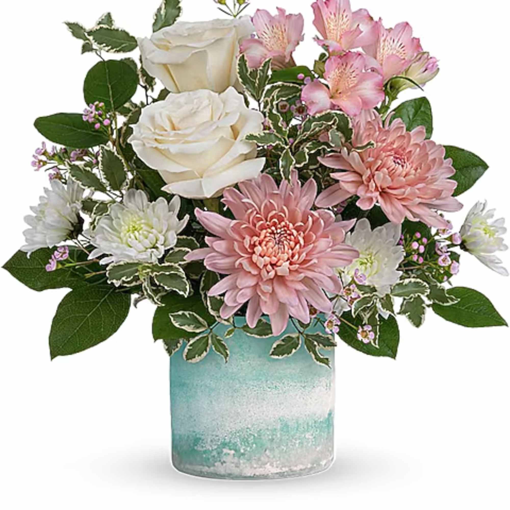 Pink and white flowers arranged in a blue glass vase