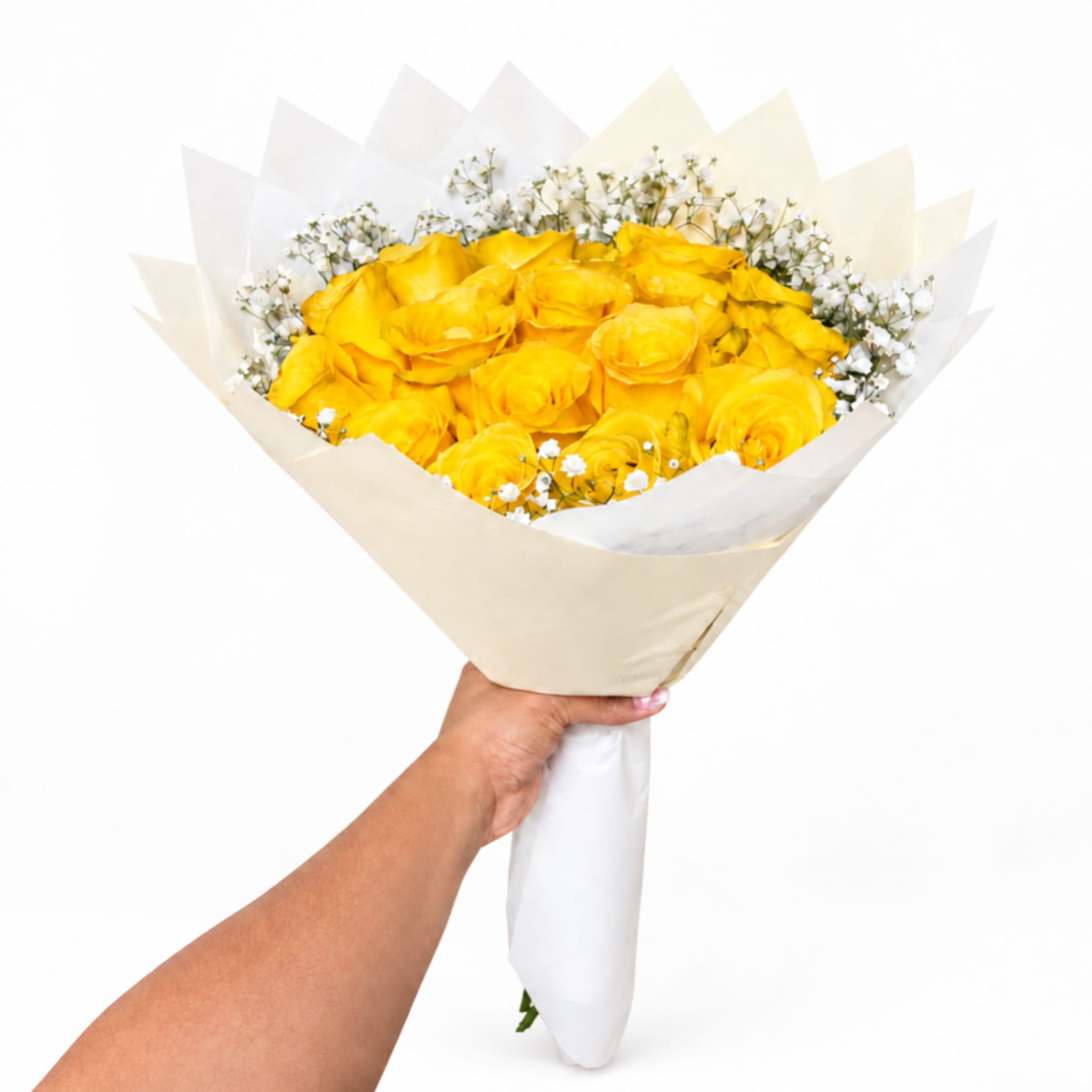 Handheld bouquet of yellow roses with small white filler flowers