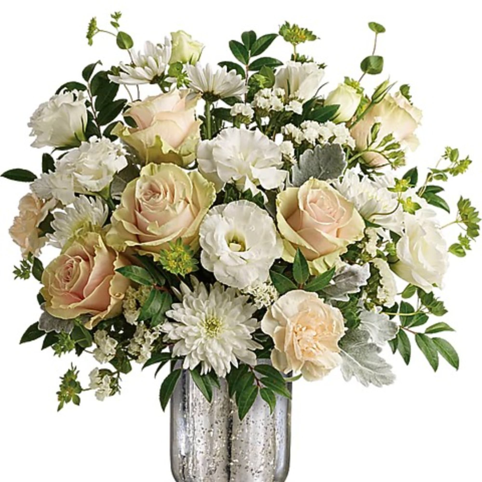 White and blush flowers arranged in a silver vase