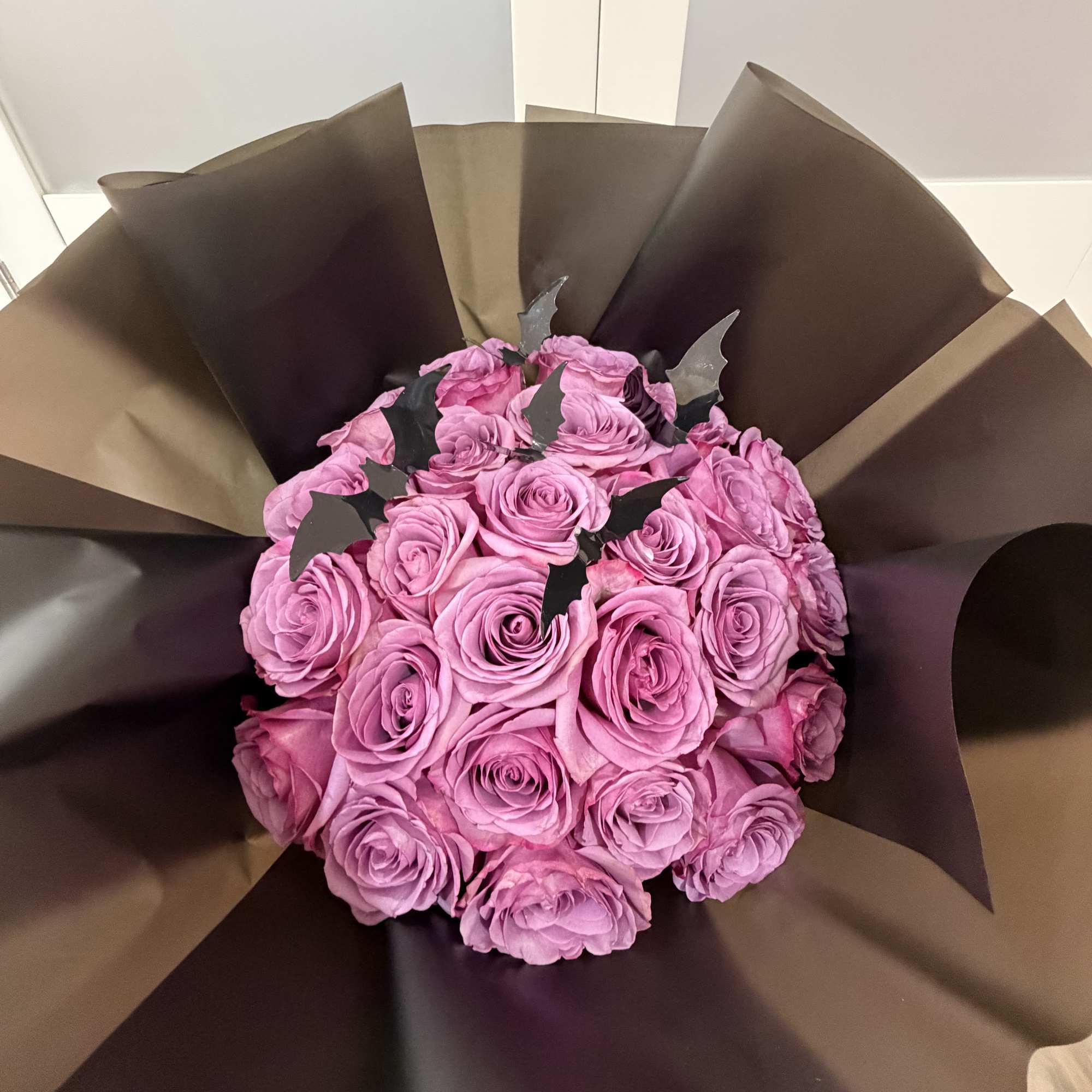A captivating arrangement that blends elegance with a touch of mystery.

Our Midnight