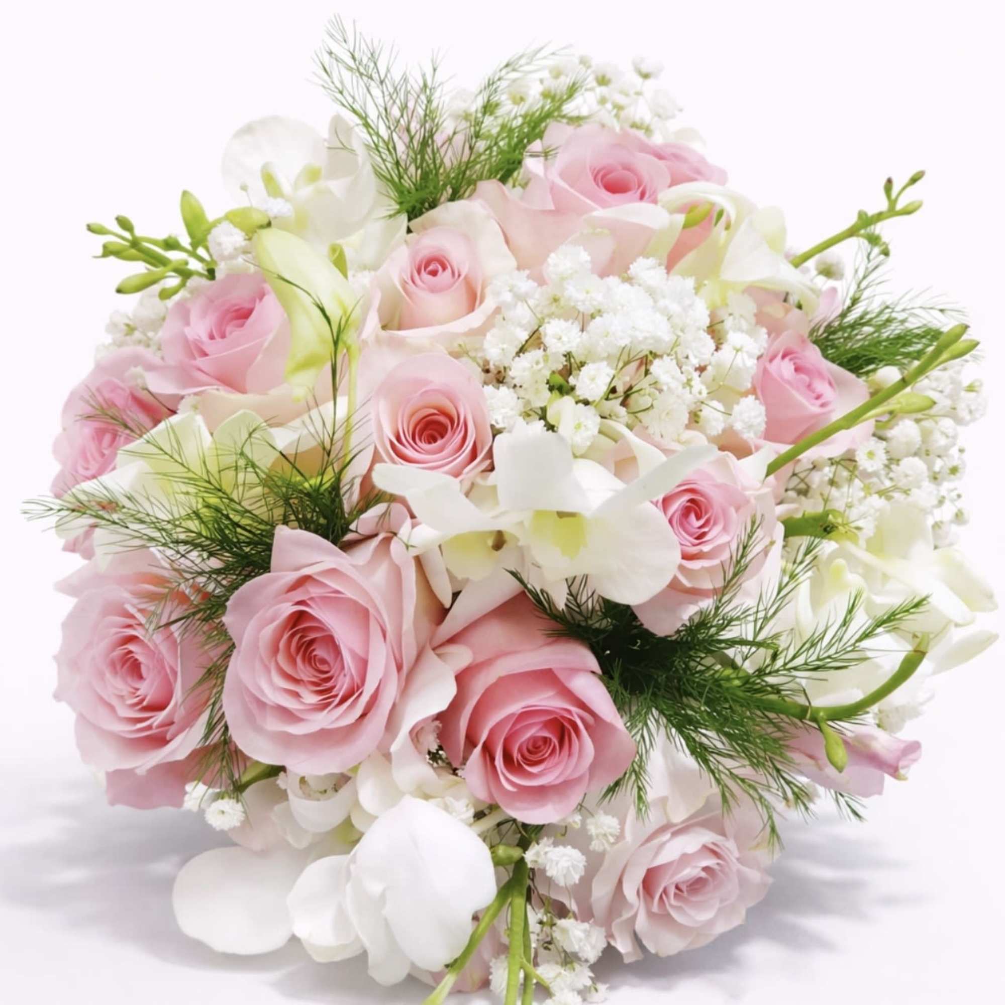 Soft, romantic and perfectly round-this wedding bouquet gives the bride a gently