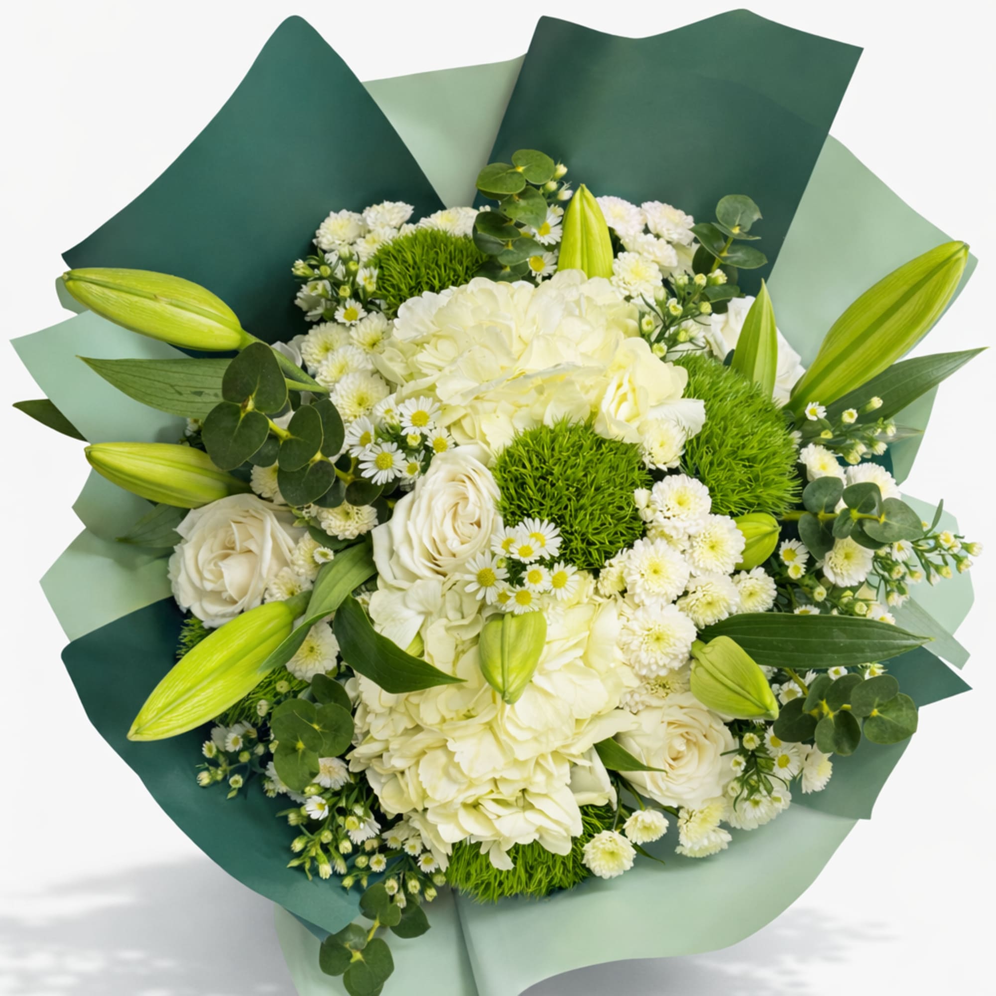 Creamy white hydrangeas, white roses, and petite daisies cluster into a soft