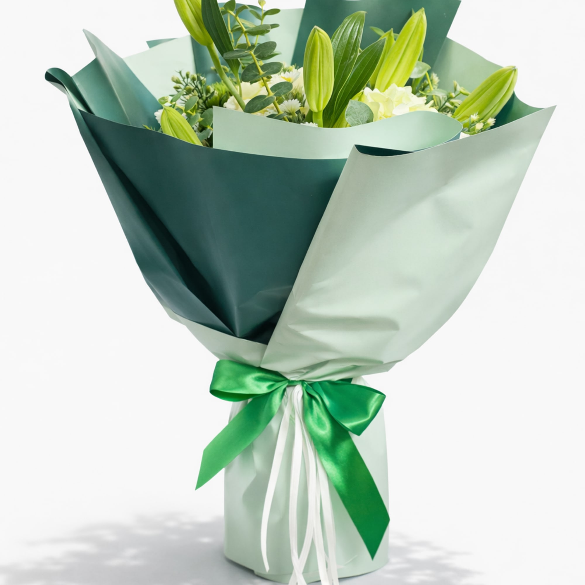 Creamy white hydrangeas, white roses, and petite daisies cluster into a soft, photo 2 of 2
