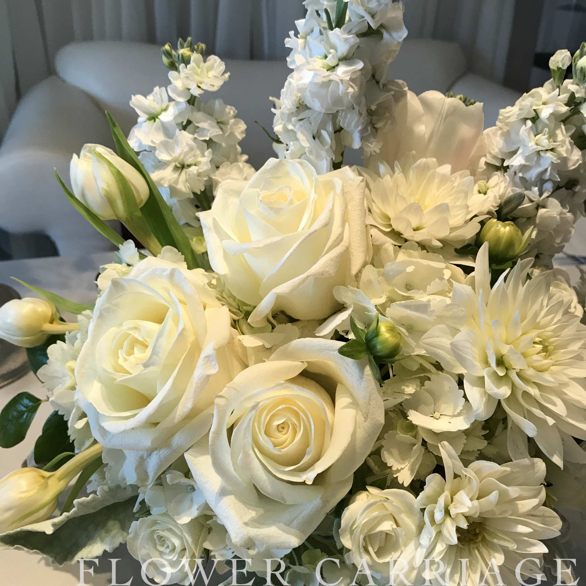 White rose bouquet with daisies and tall white blooms