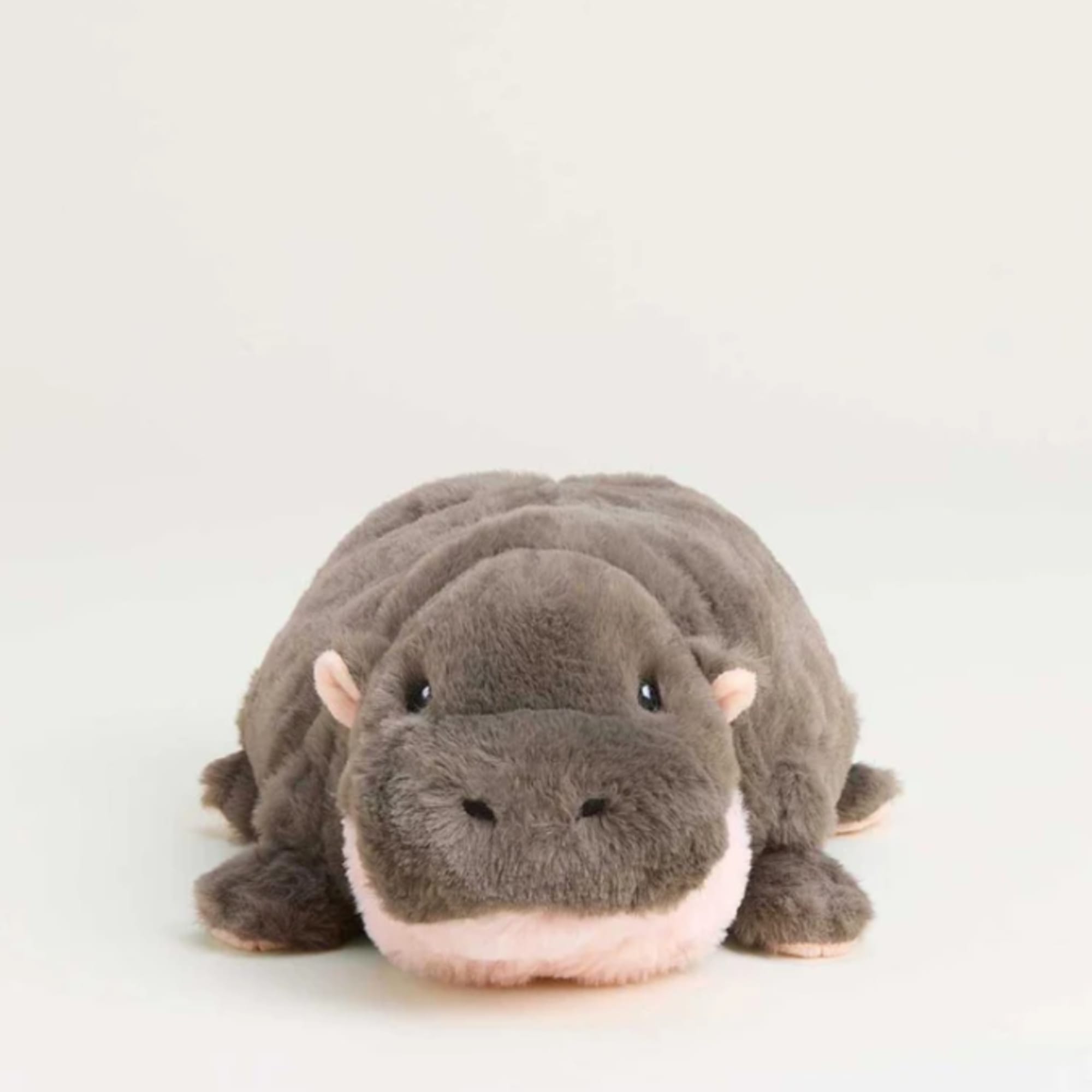 Plush hippo toy on a plain white background
