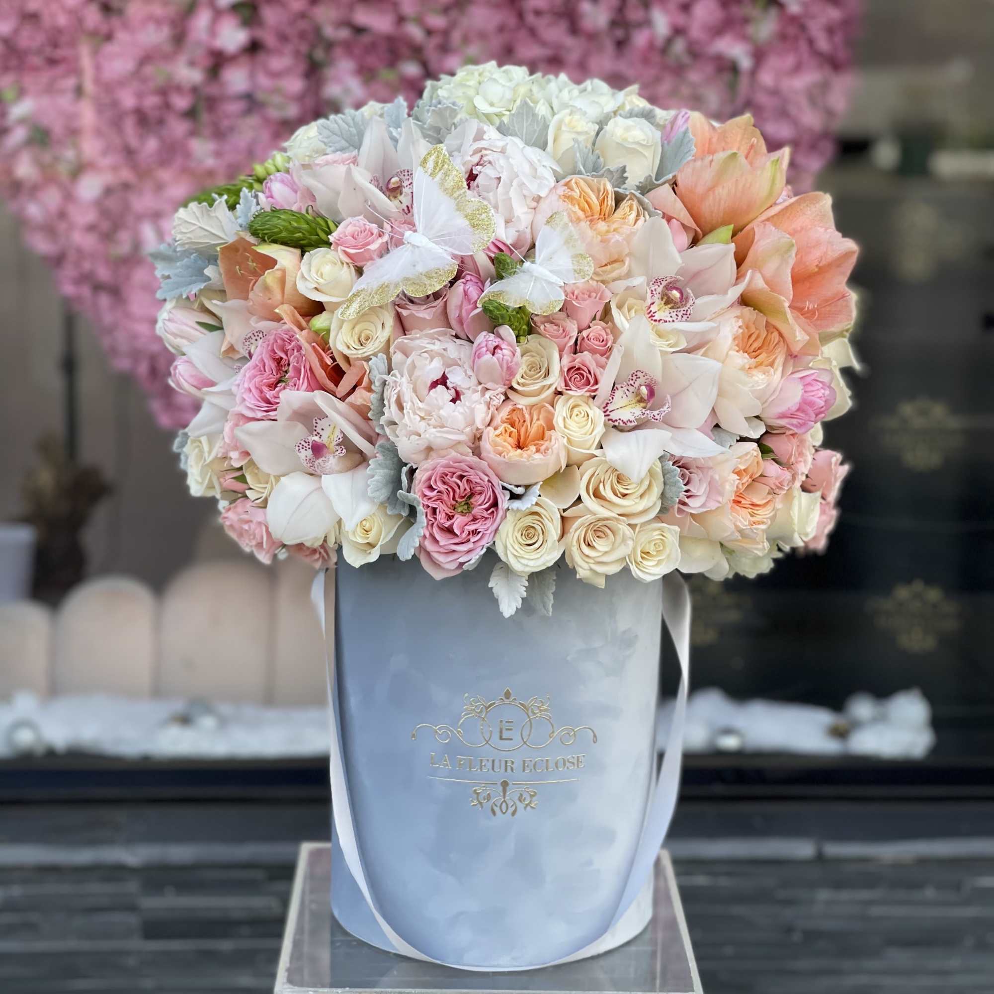 Beautiful pinks, whites and peaches with light blue box