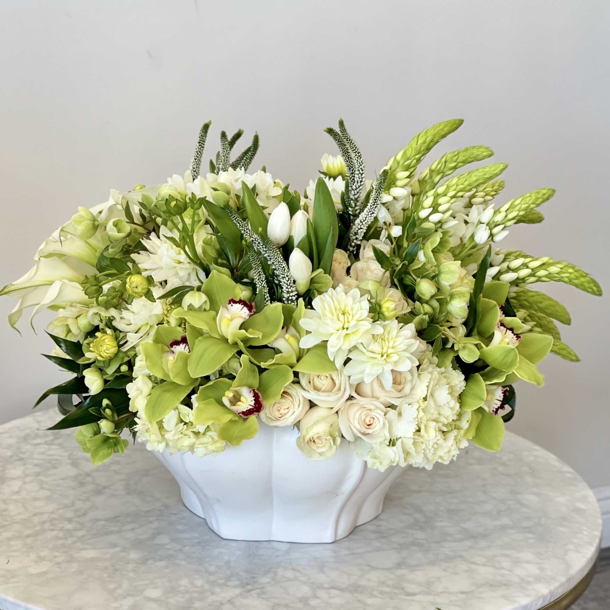All whites and greens in our big white vase
FRESH CUT flowers