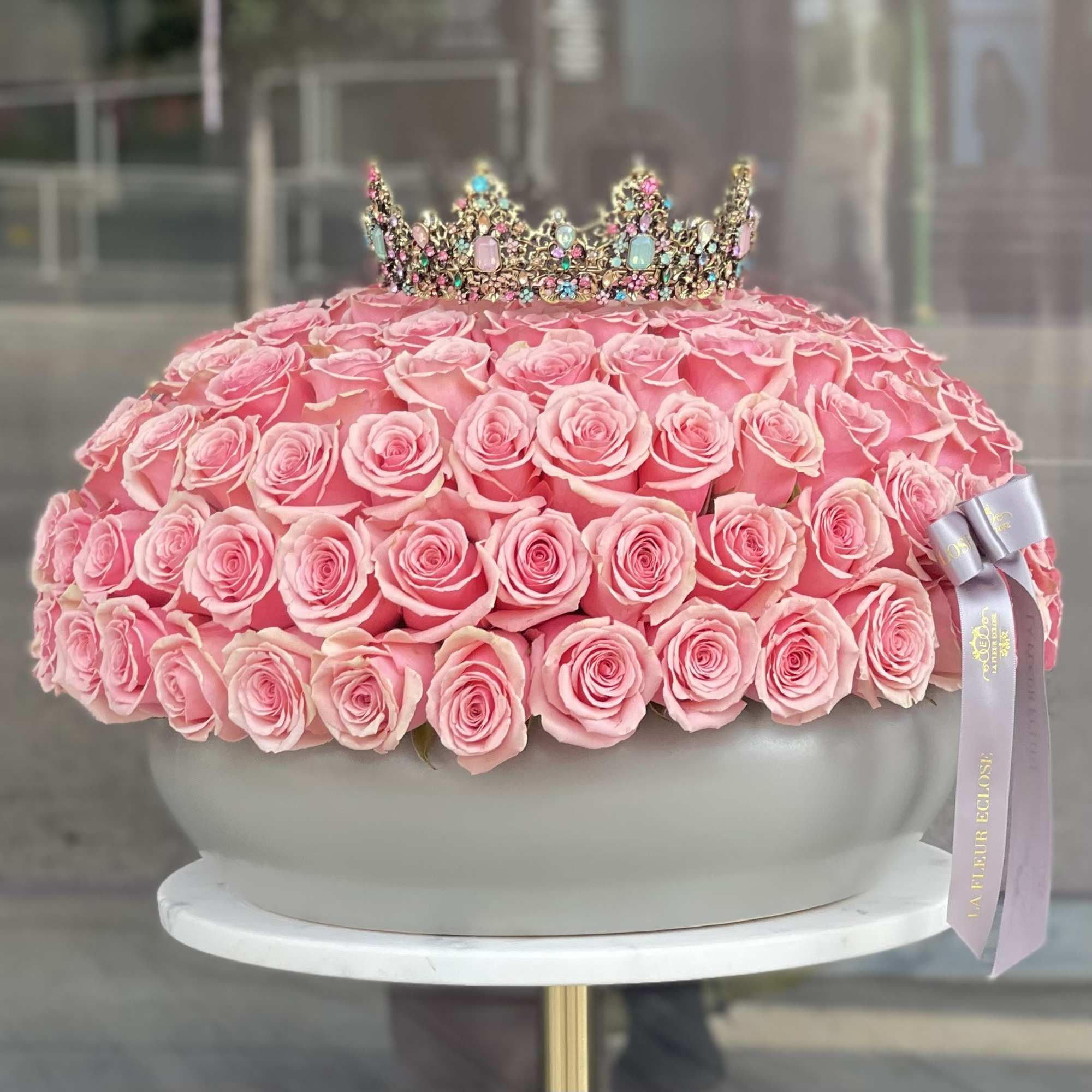 standart - 100 pink roses in our grey vase 
comes with a, photo 3 of 5