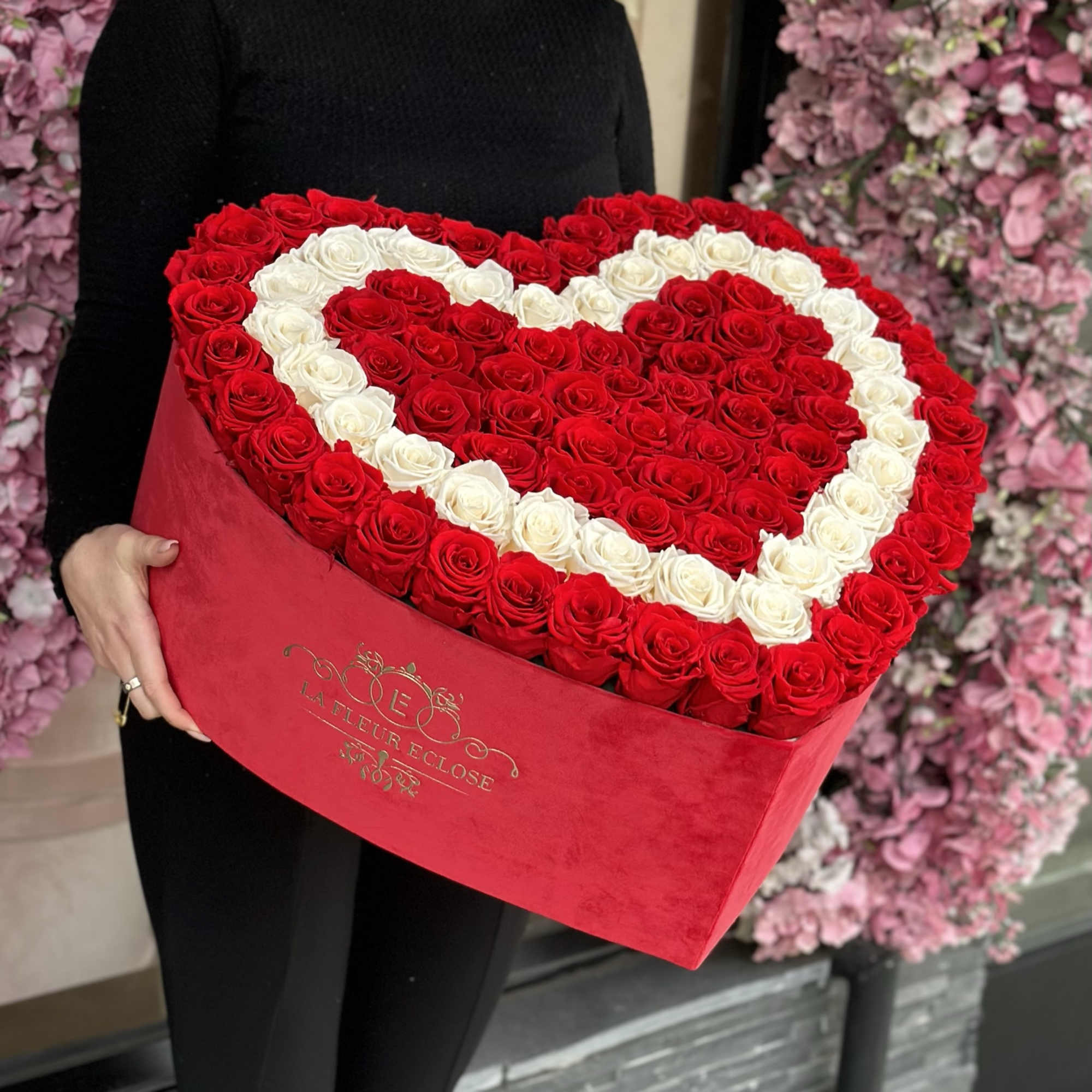 Heart-shaped box of red and white roses
