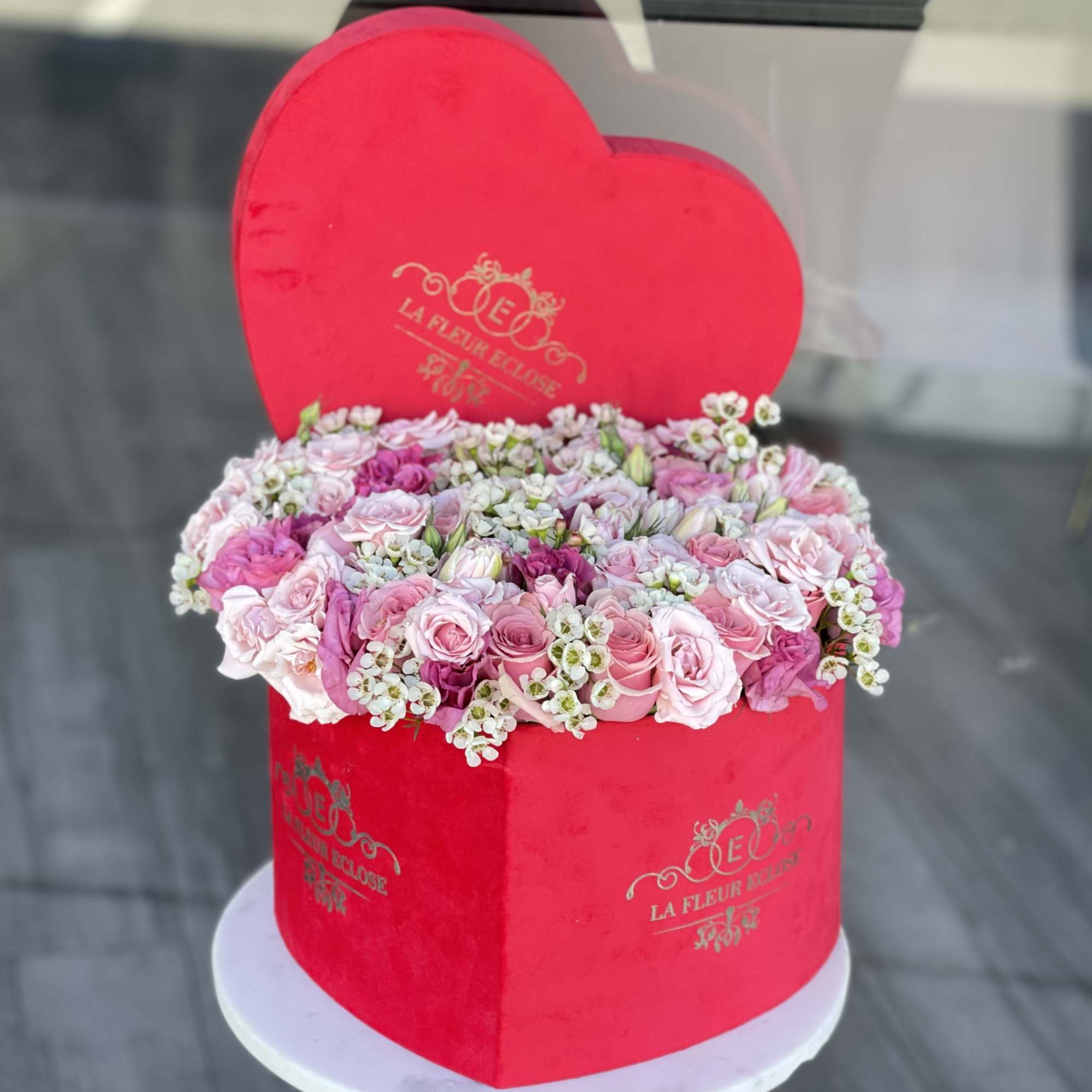 Our heart -shape velvet signature box with the mix of flowers