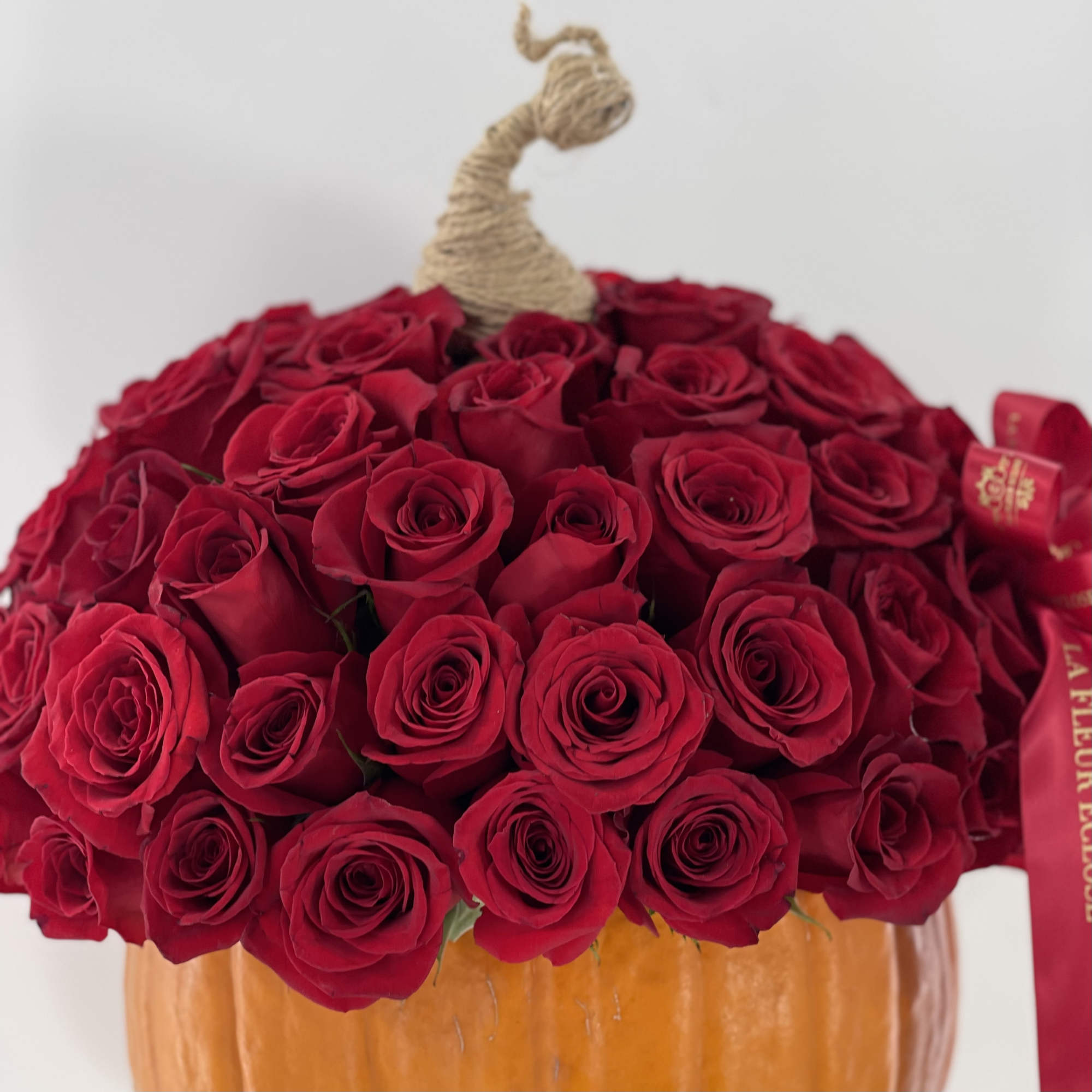 75 red roses in an pumpkin , photo 3 of 3