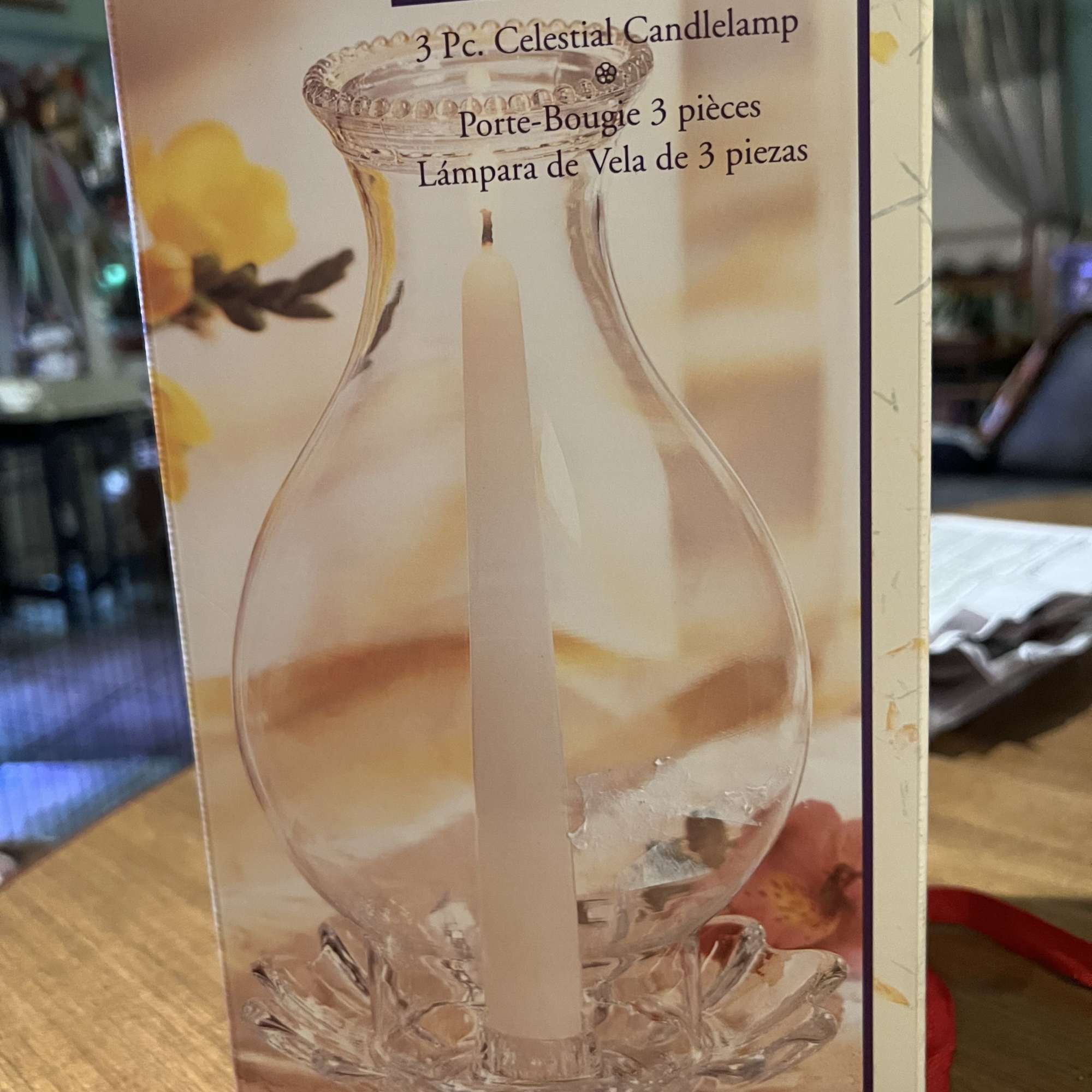 Boxed glass candlelamp with a white taper candle