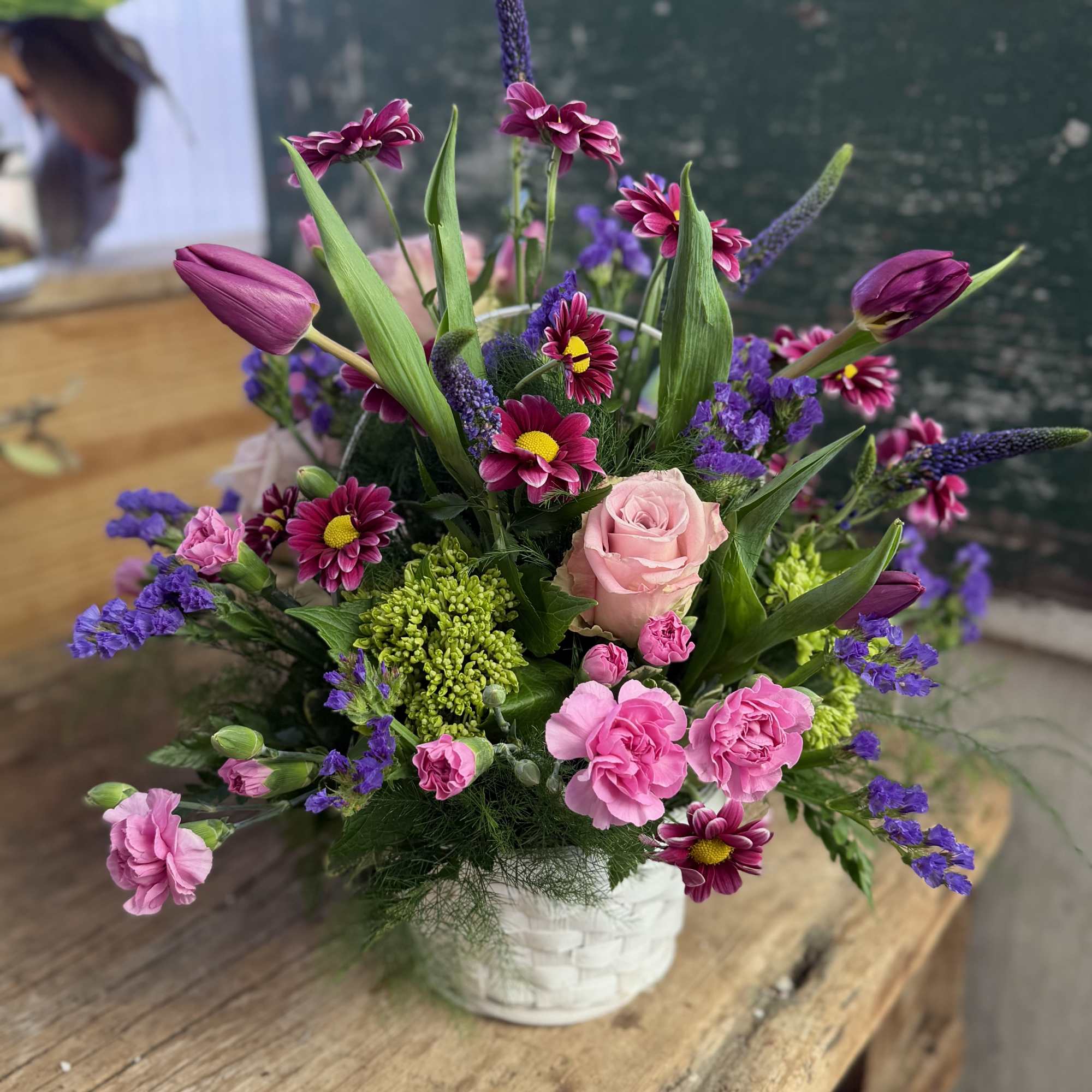 Lavender and lovely, our fresh-packed Greeting Basket features alstroemeria, roses, daisies, mums