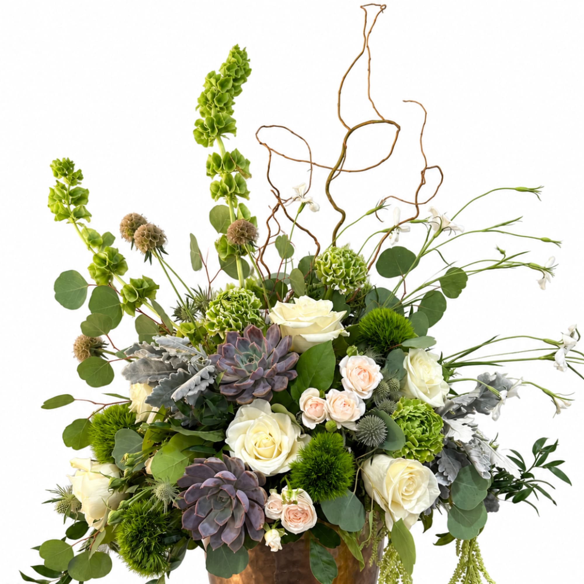 Mixed floral arrangement with roses, succulents, and curly branches in a vase
