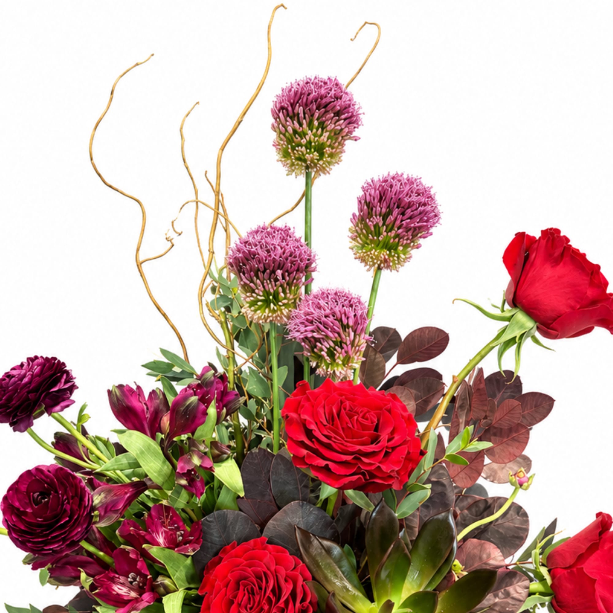 Bouquet of red roses, purple blooms, and burgundy foliage with curly branches
