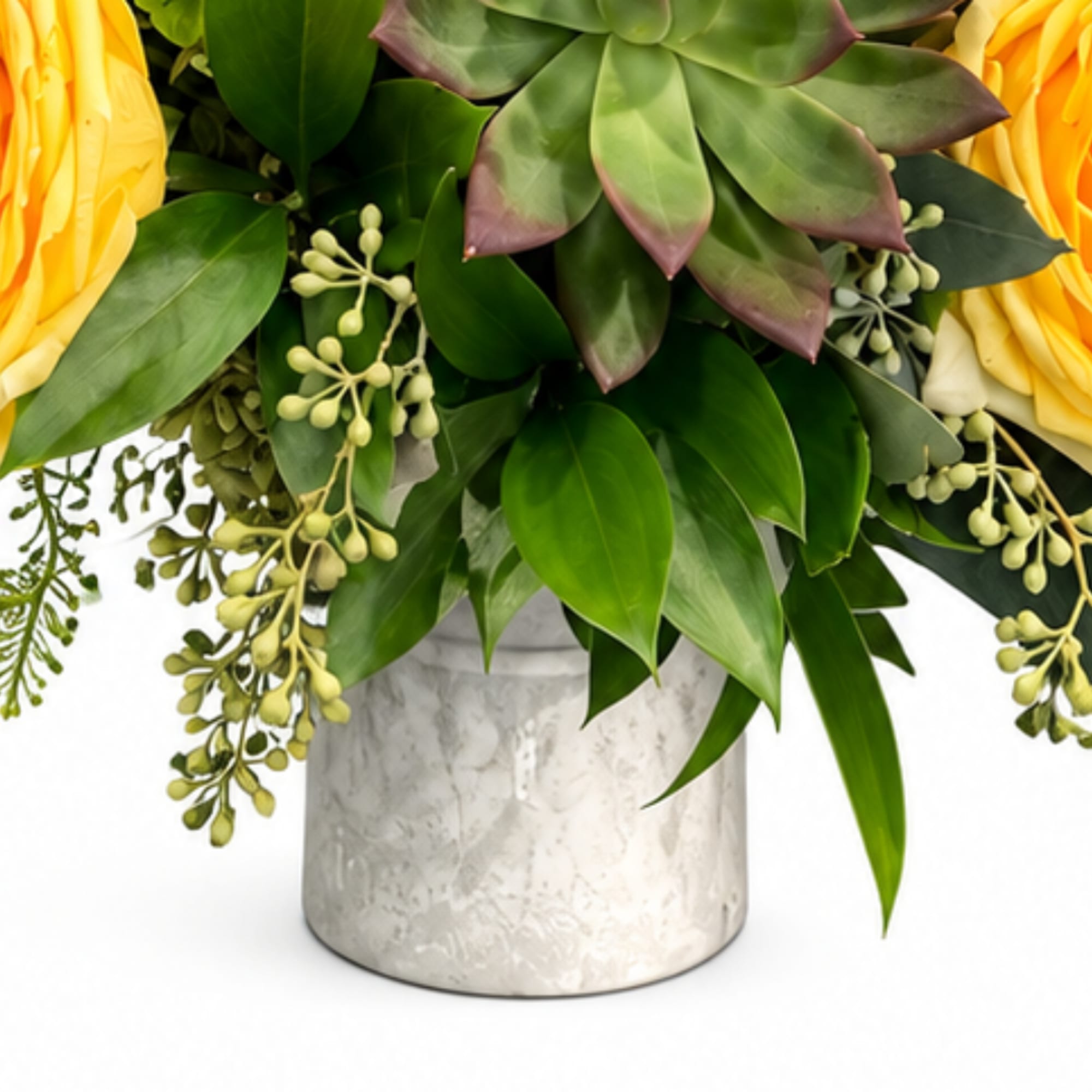 Yellow roses and succulents arranged in a marble vase