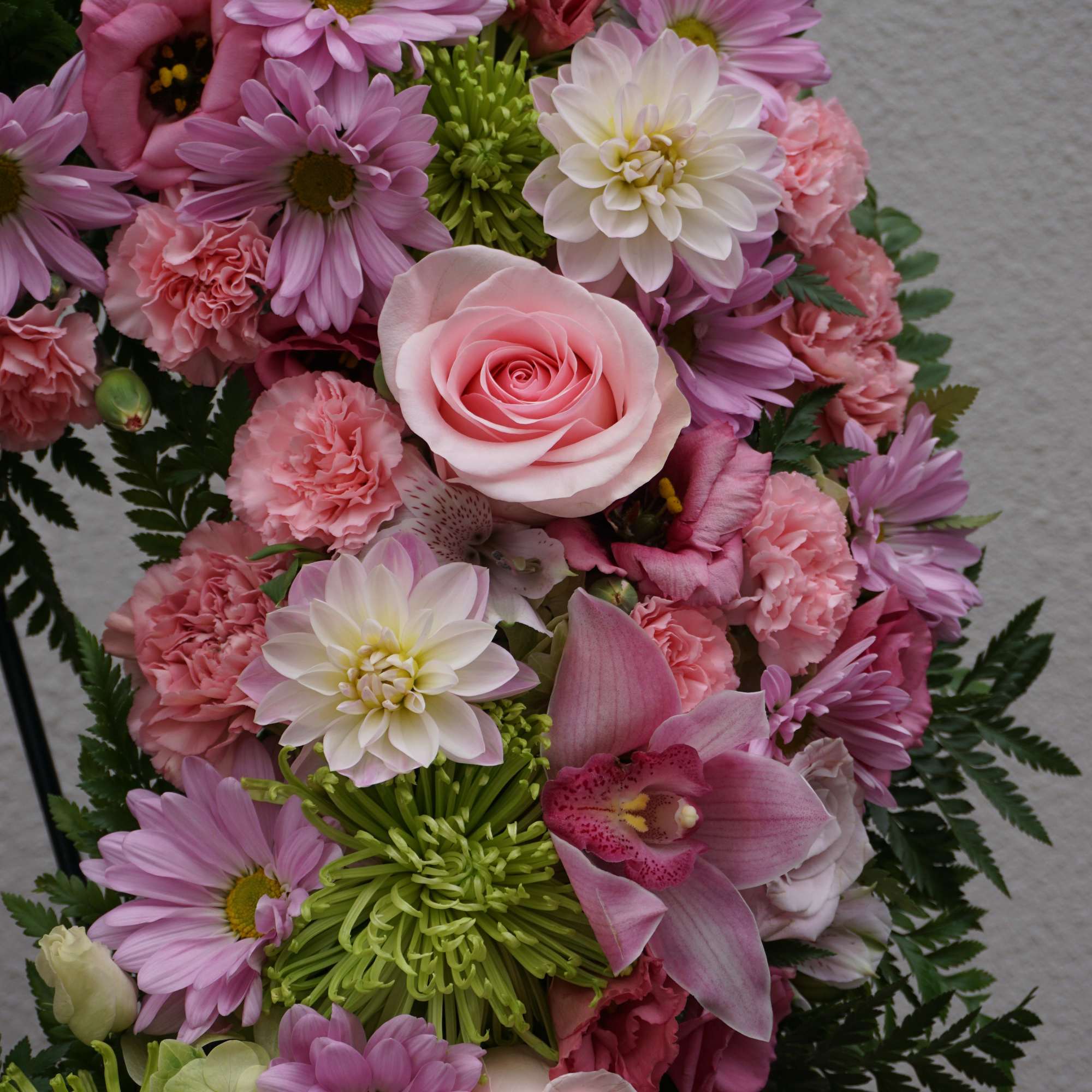 Pink and white mixed flower bouquet with roses and daisies