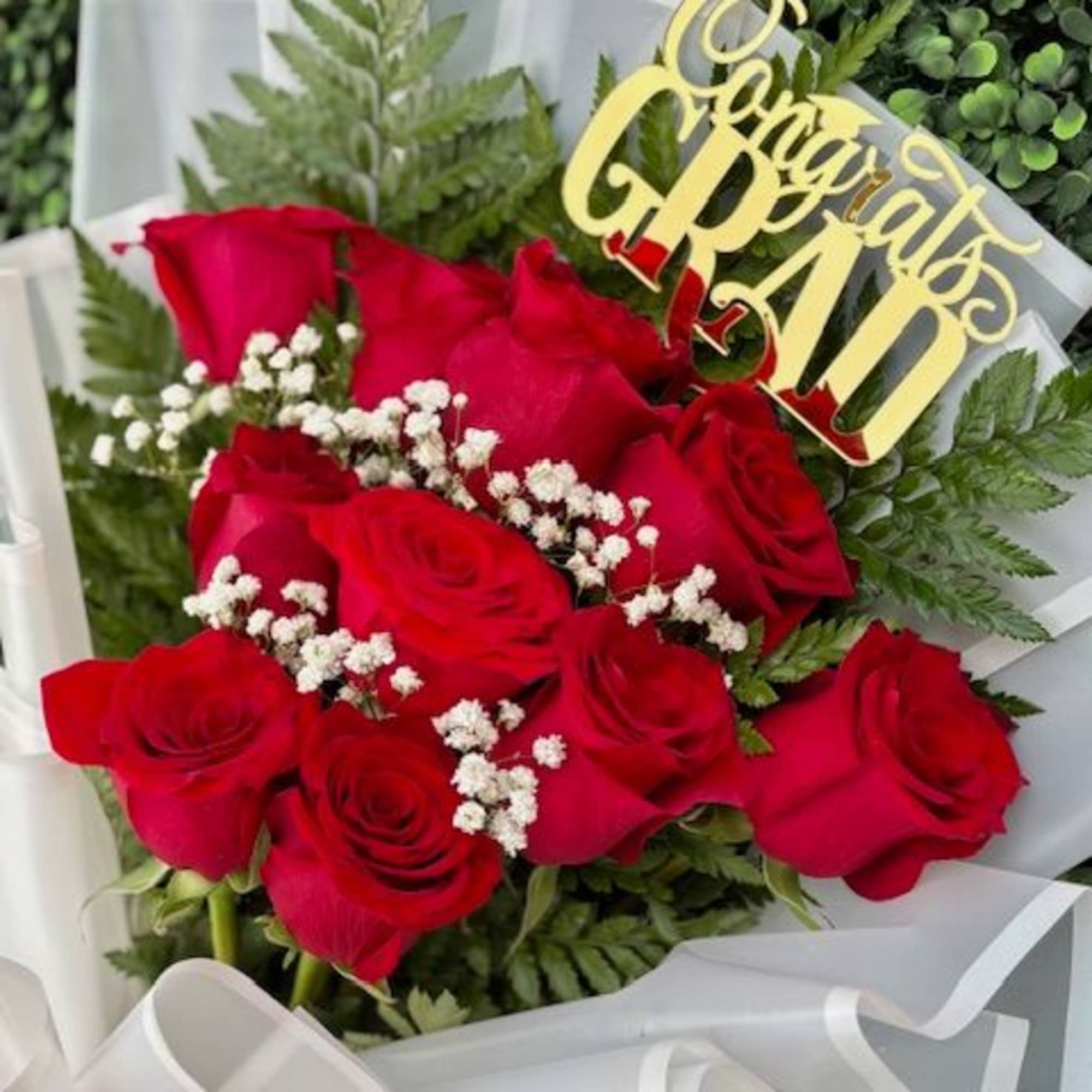 Vivid red roses take center stage in this Congrats Grad bouquet, making, photo 2 of 3