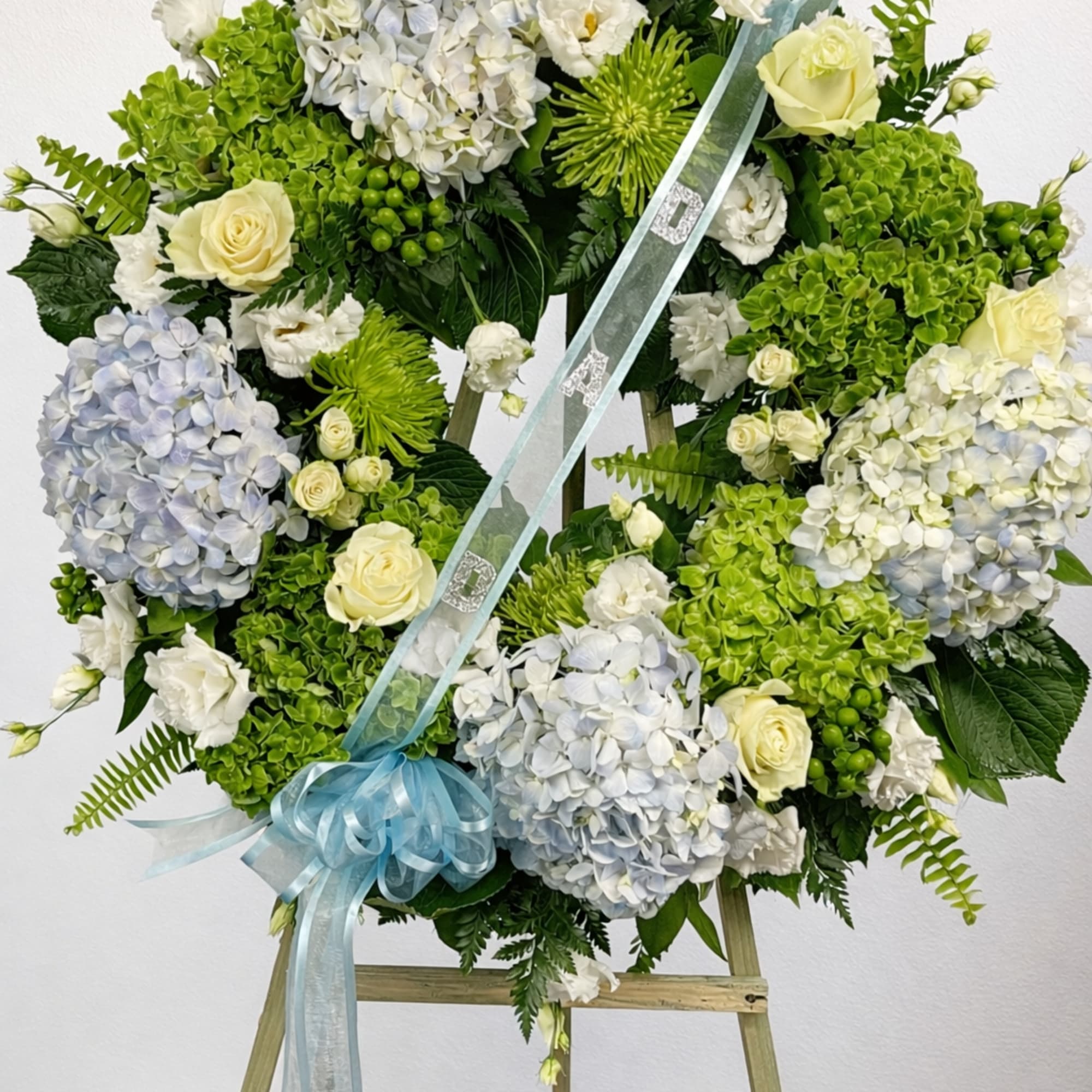 This is a graceful and elegant floral arrangement designed to offer comfort