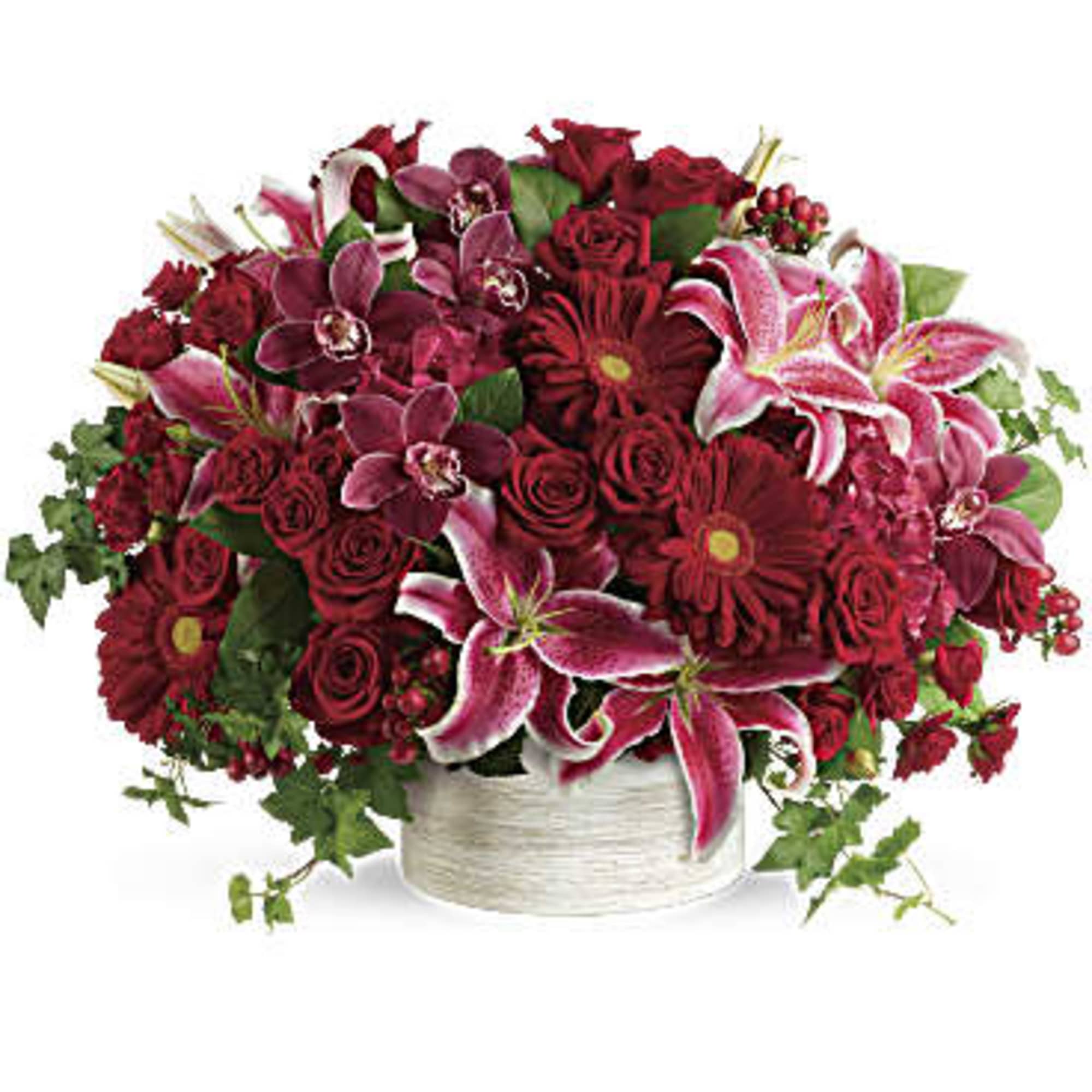 Brimming with hydrangea, orchids, roses and lilies in fabulous fuchsias and radiant