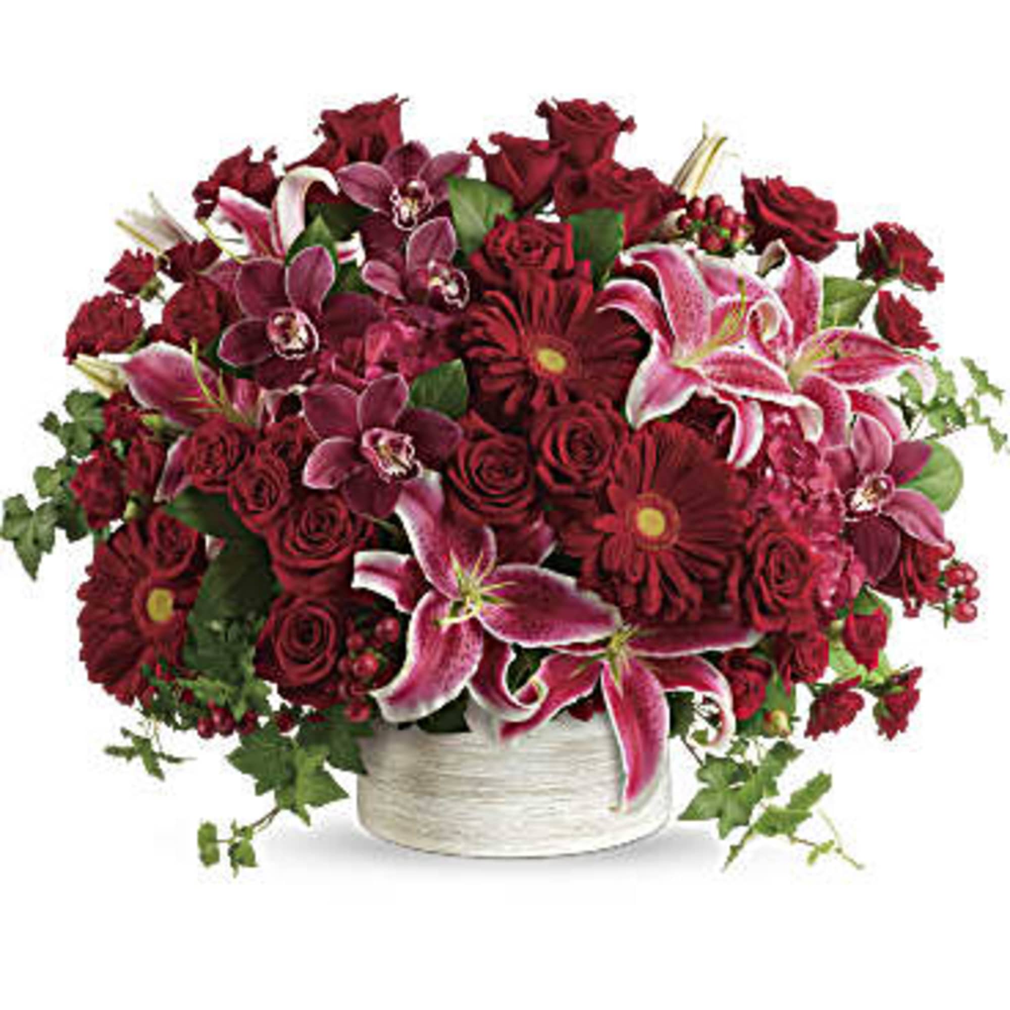 Brimming with hydrangea, orchids, roses and lilies in fabulous fuchsias and radiant