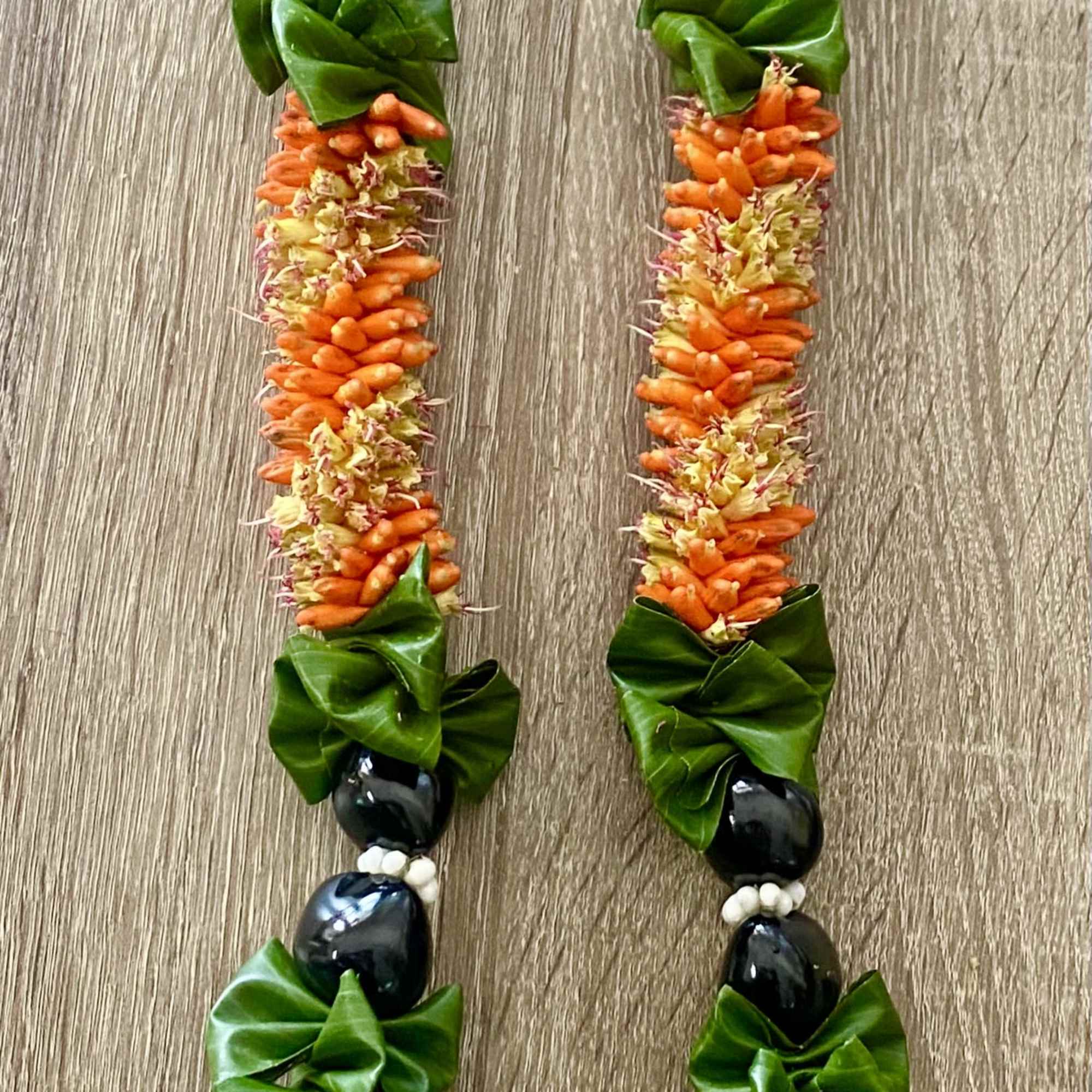 CIGAR FLOWER/ KUKUI NUT/TI LEAF LEI *NOTE 40.00 MINIMUM FOR DELIVERY