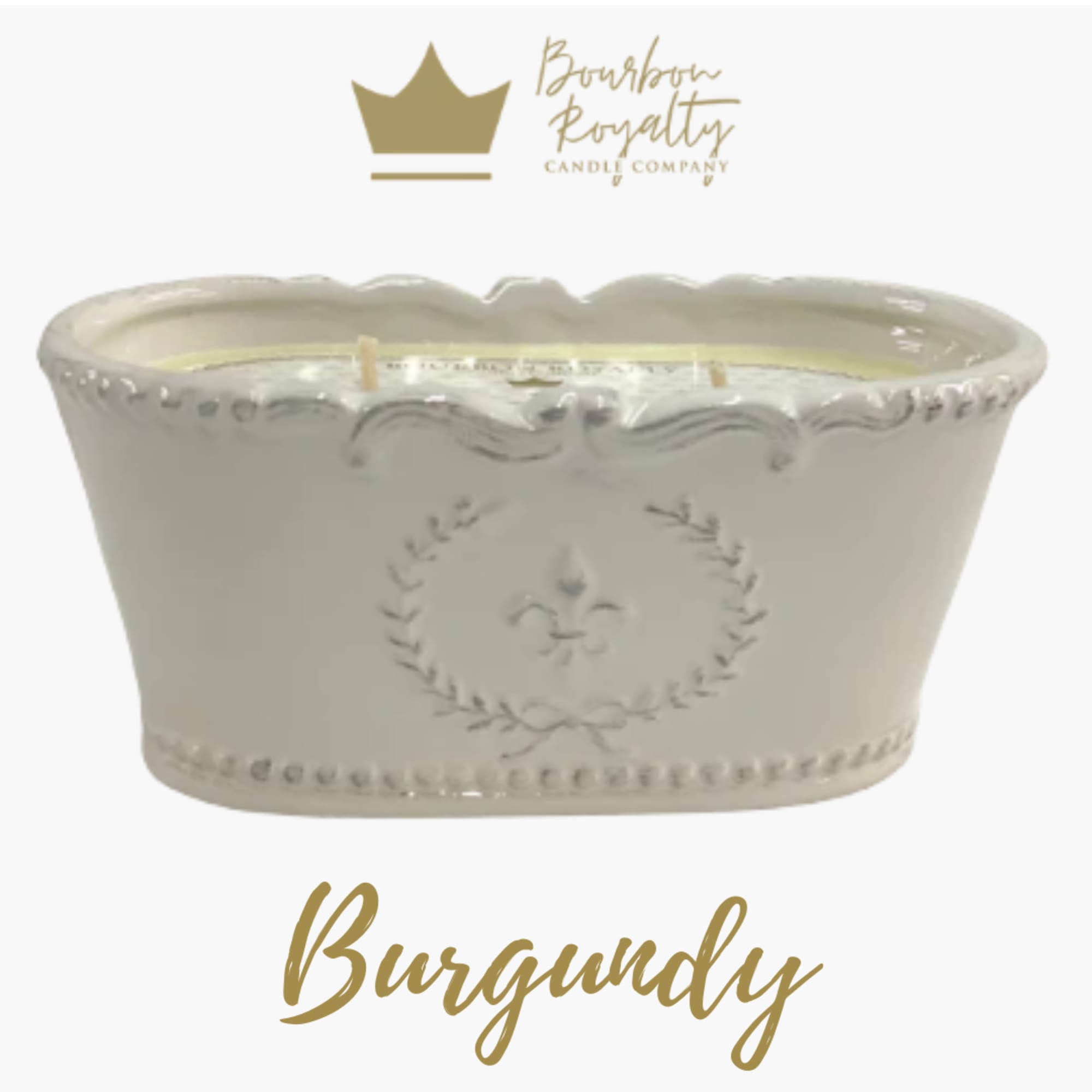 White ceramic candle vessel with gold logo and text