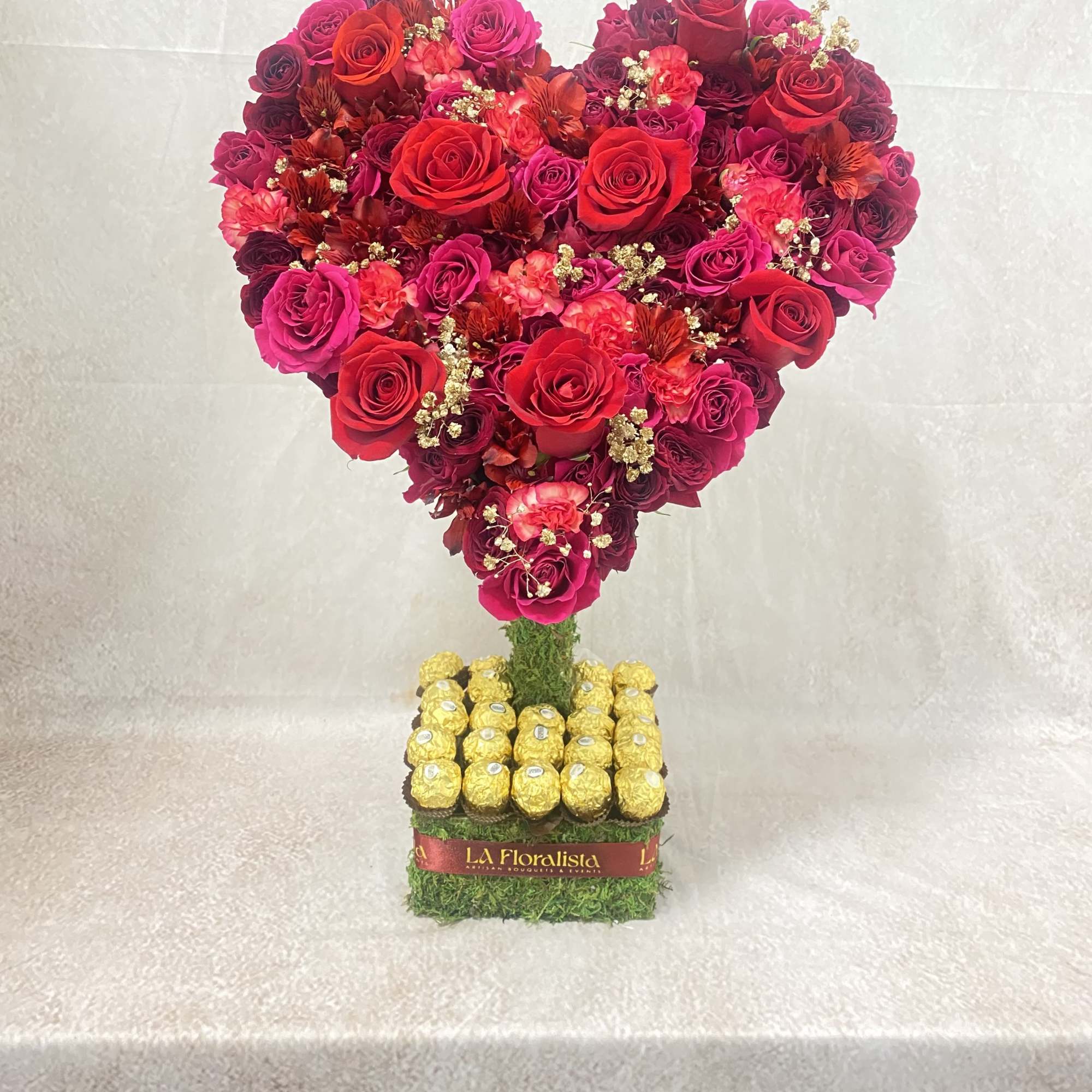 Heart-shaped rose arrangement with Ferrero Rocher chocolates on a square base, photo 2 of 3
