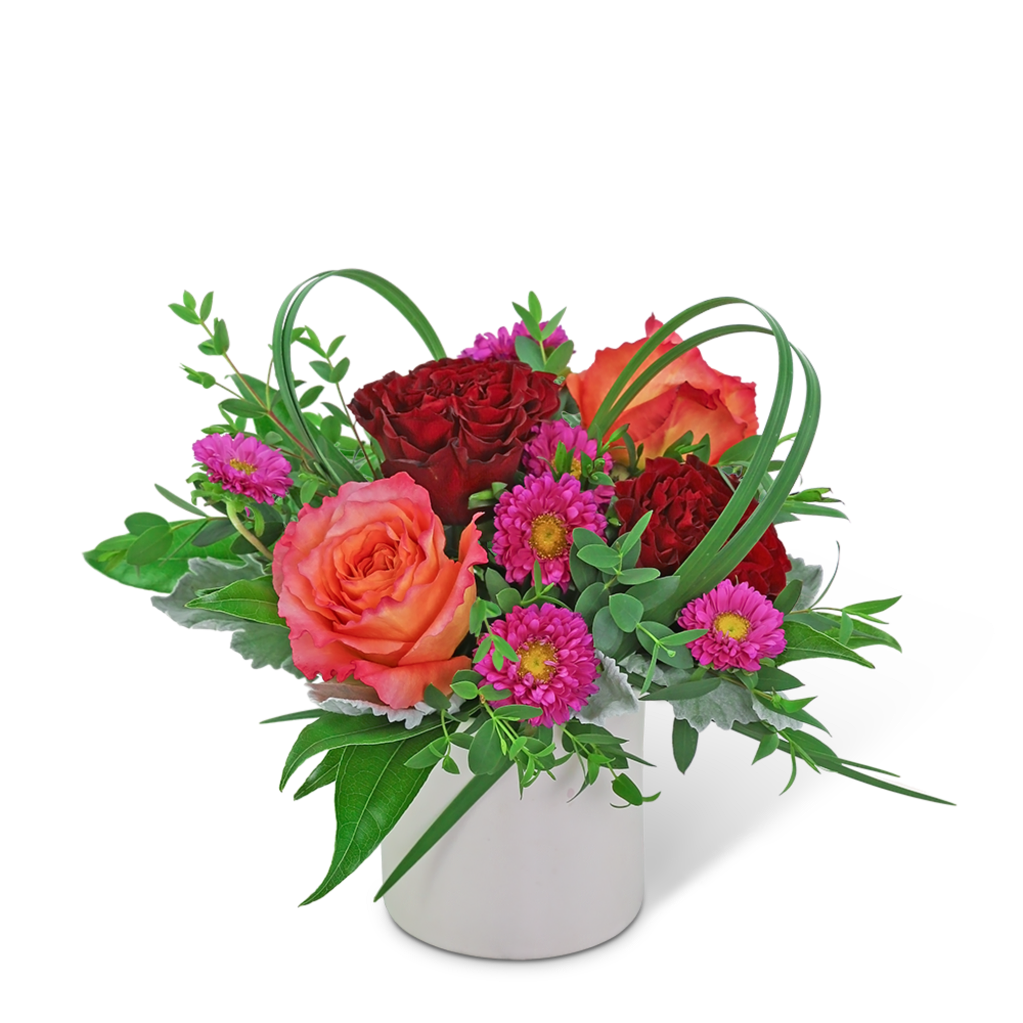 Mixed bouquet of red and orange roses with pink daisies in a white vase