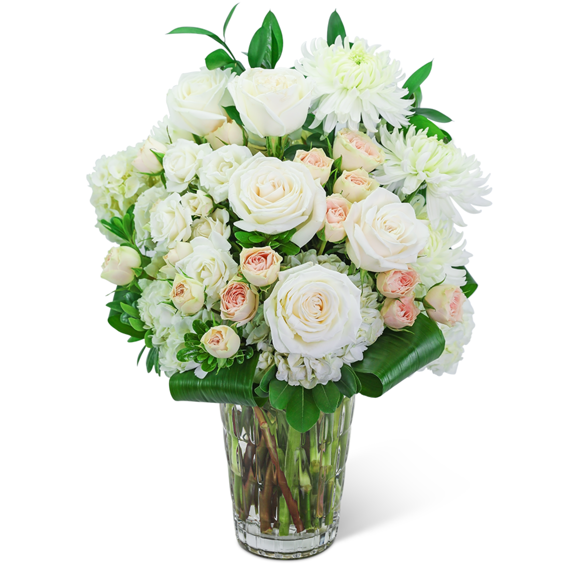 White roses and chrysanthemums in a clear glass vase