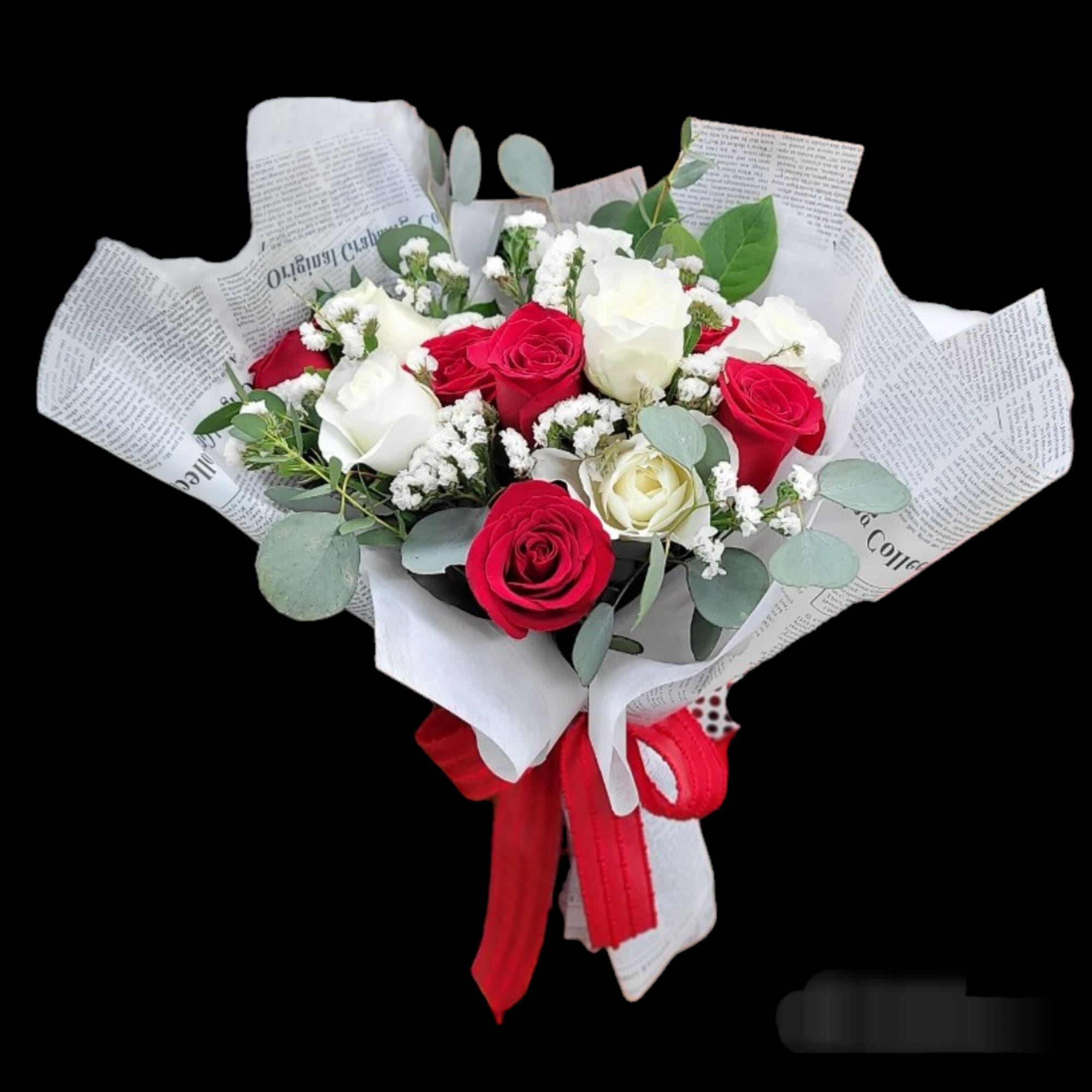 Bouquet of red and white roses wrapped in newspaper-style paper