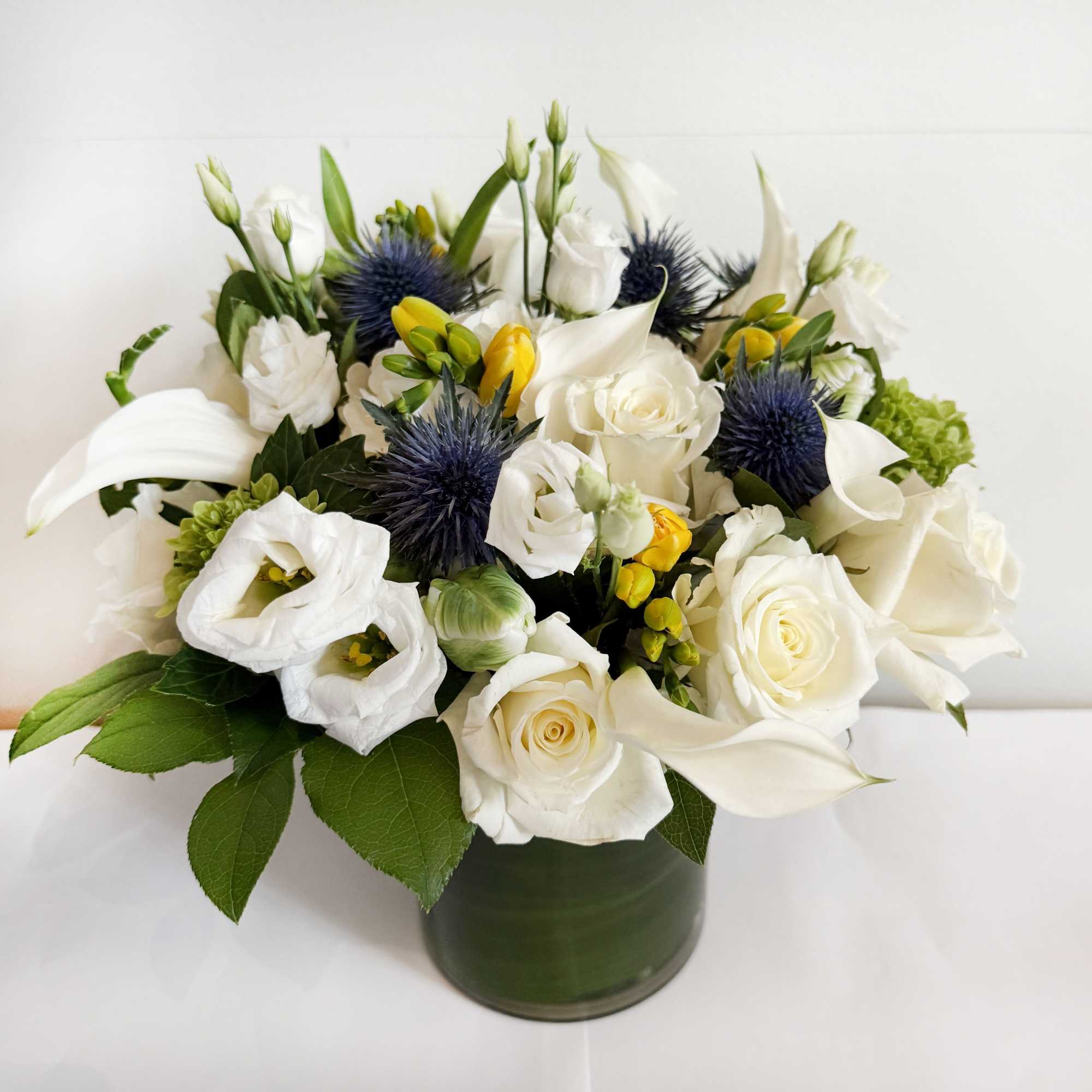 The arrangement stays in a light color tone. It's a great choice, photo 2 of 2
