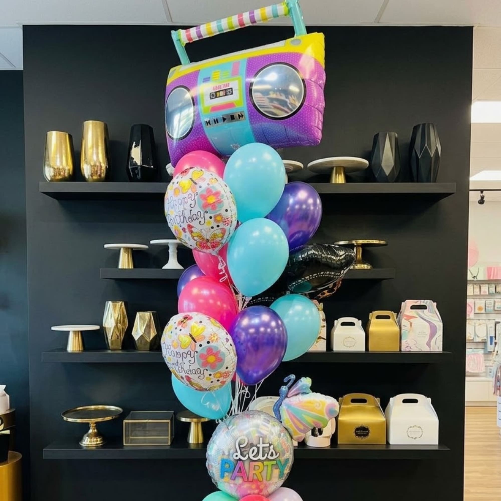 Birthday balloon bouquet with colorful foil and latex balloons