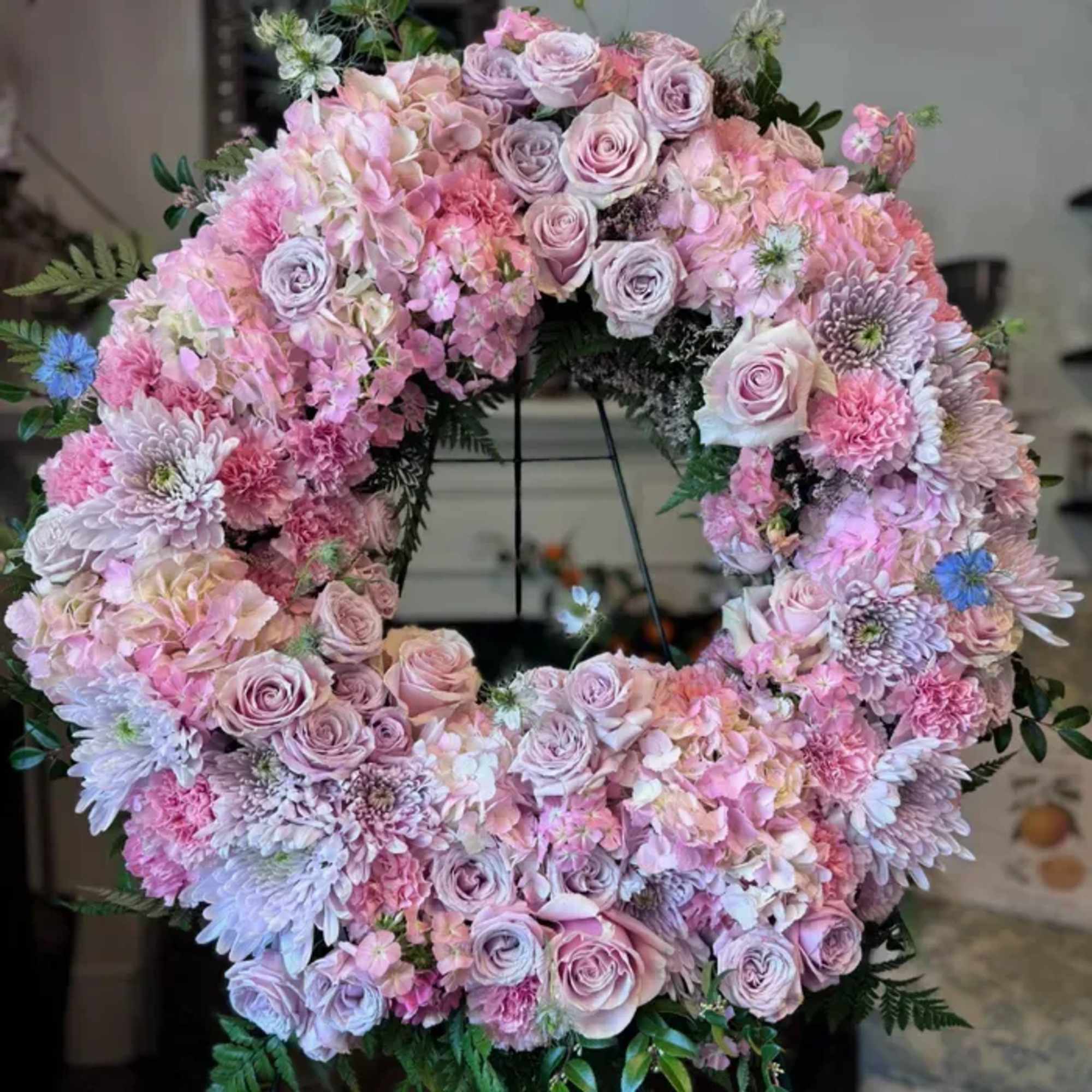 Honor the memory of a loved one with our Standing Floral Wreath, photo 2 of 3