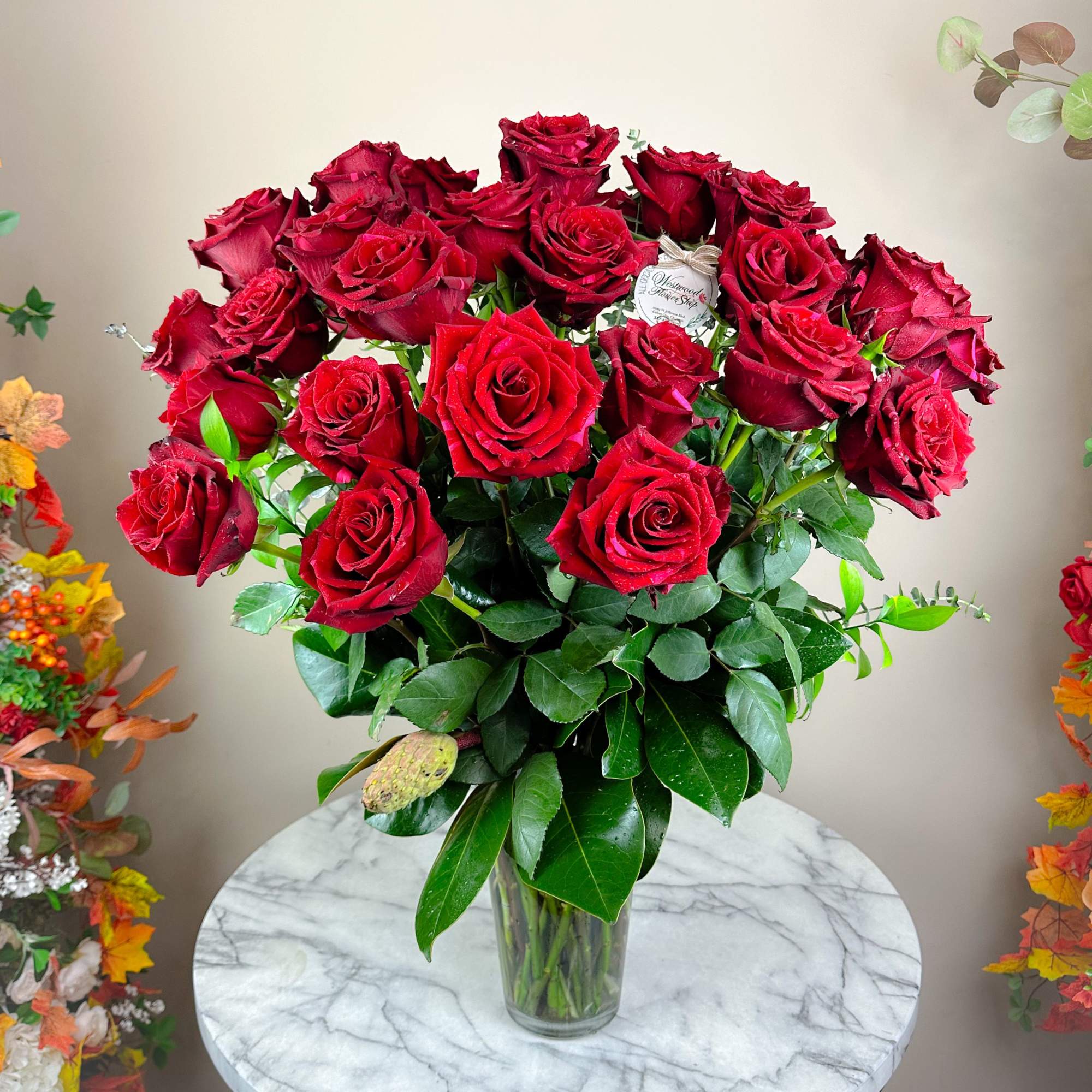 Bouquet of red roses in a clear glass vase