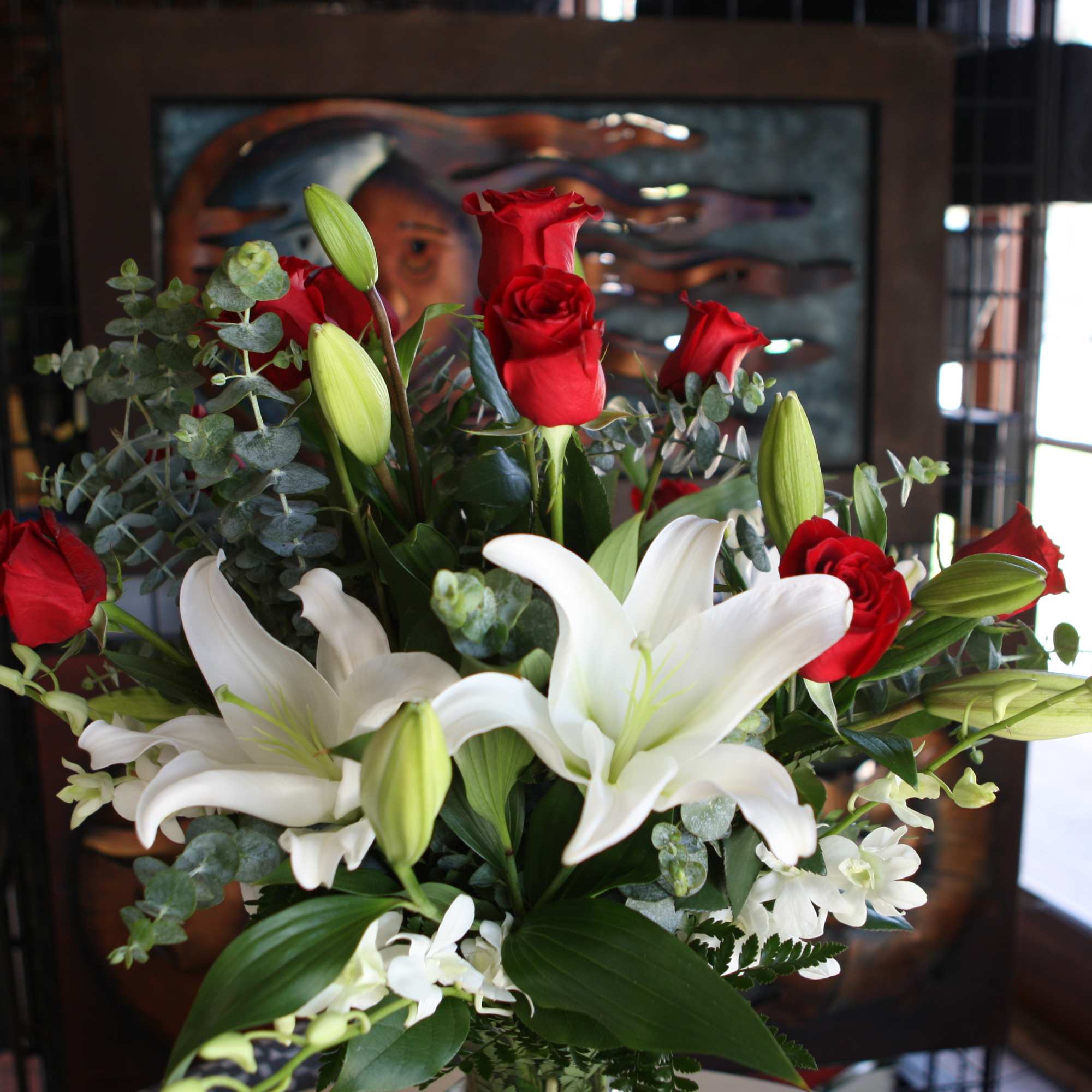 Bouquet of red roses and white lilies with greenery, photo 2 of 3