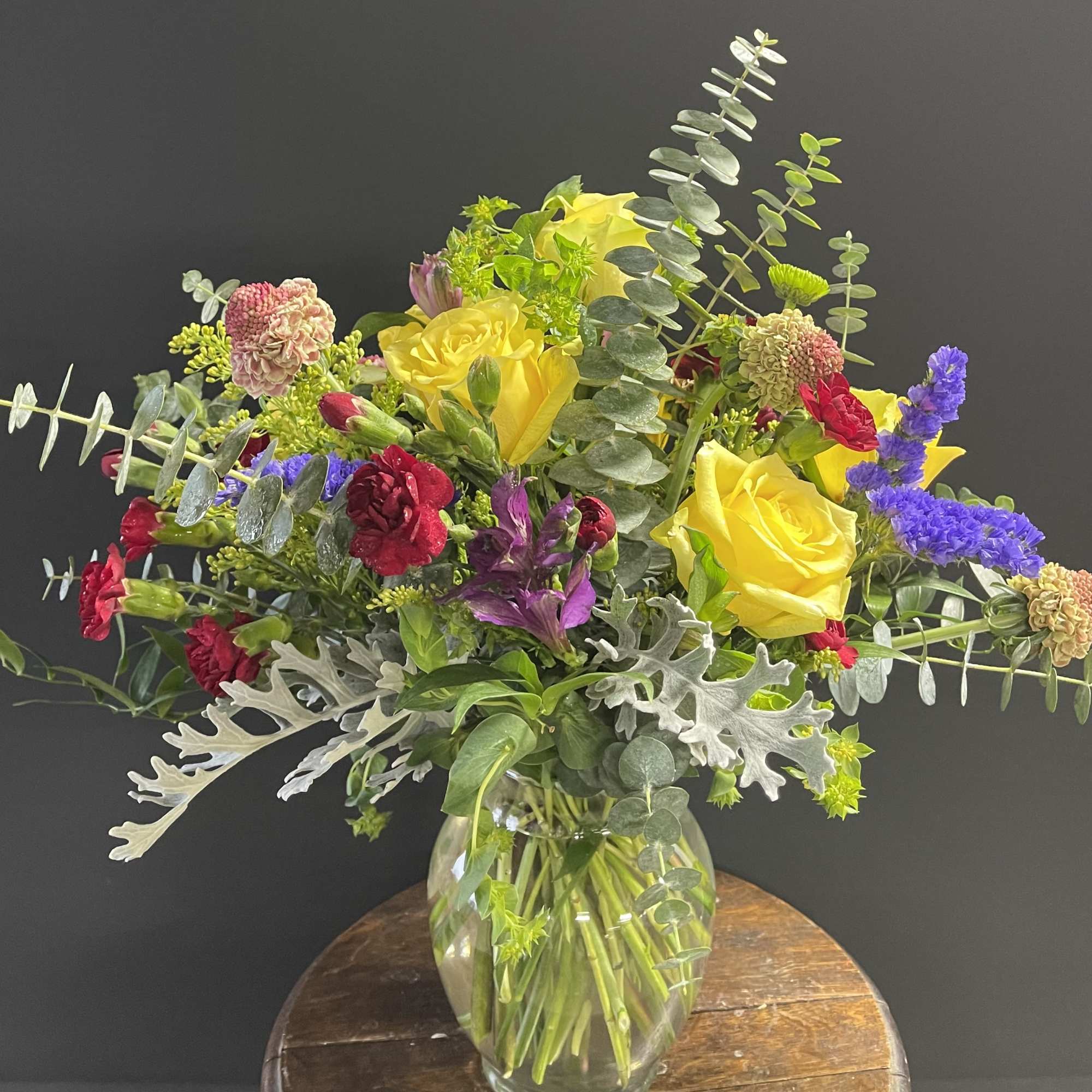 Bright and Cheerful and flowers all around! What a lovely display of