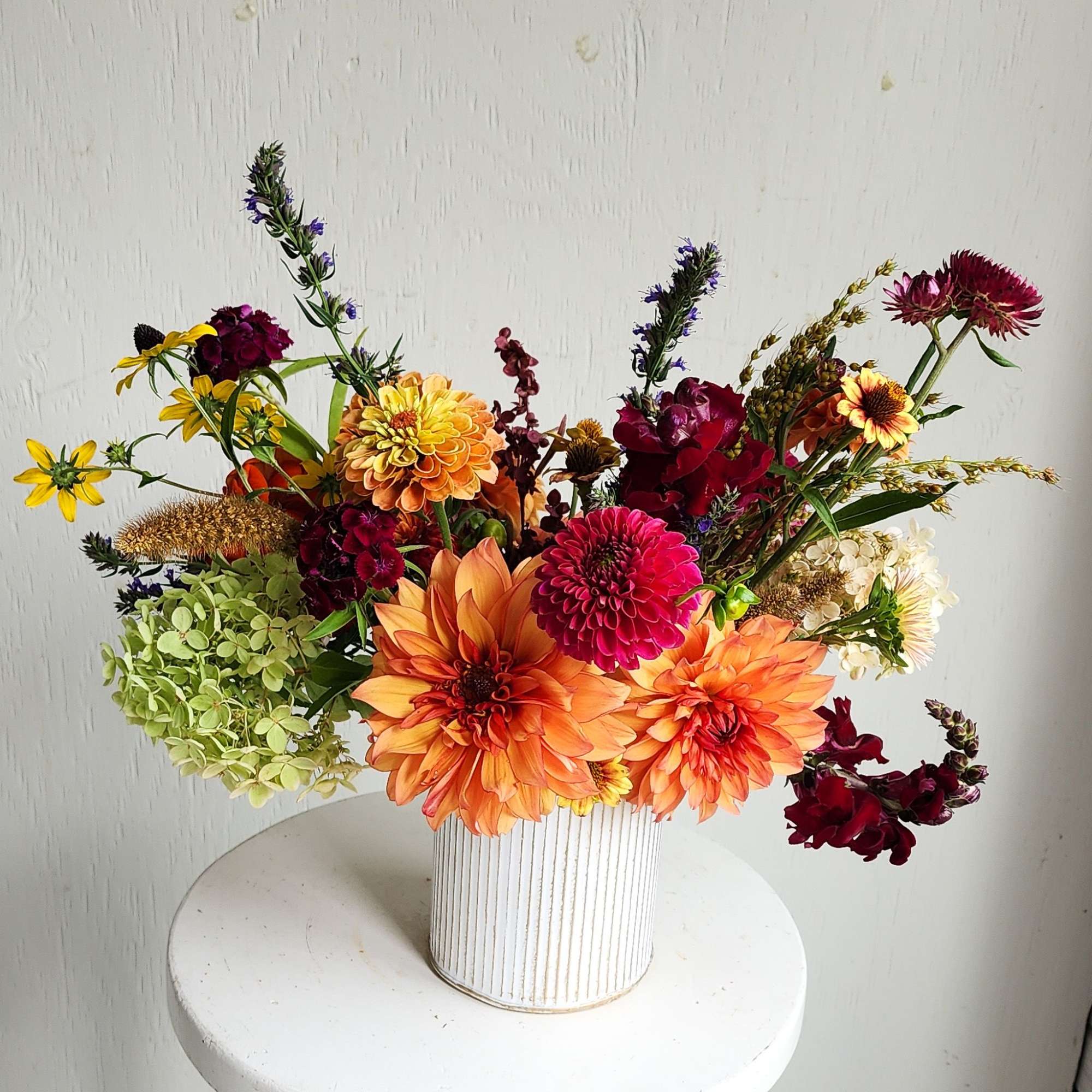 A seasonal array of fall colors to usher is a warm, peaceful