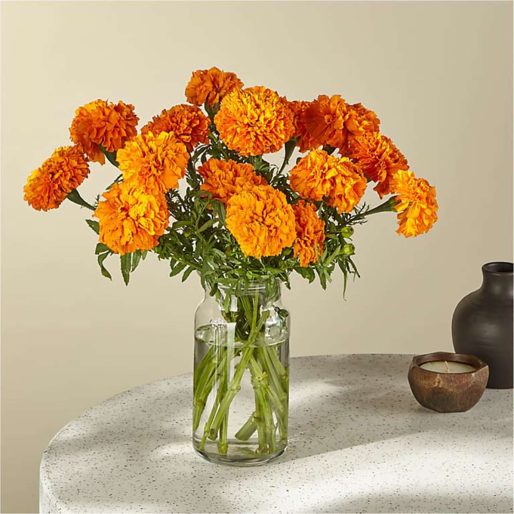 Sublimely orange and long-lasting marigolds bring a subtle frill and ritual to