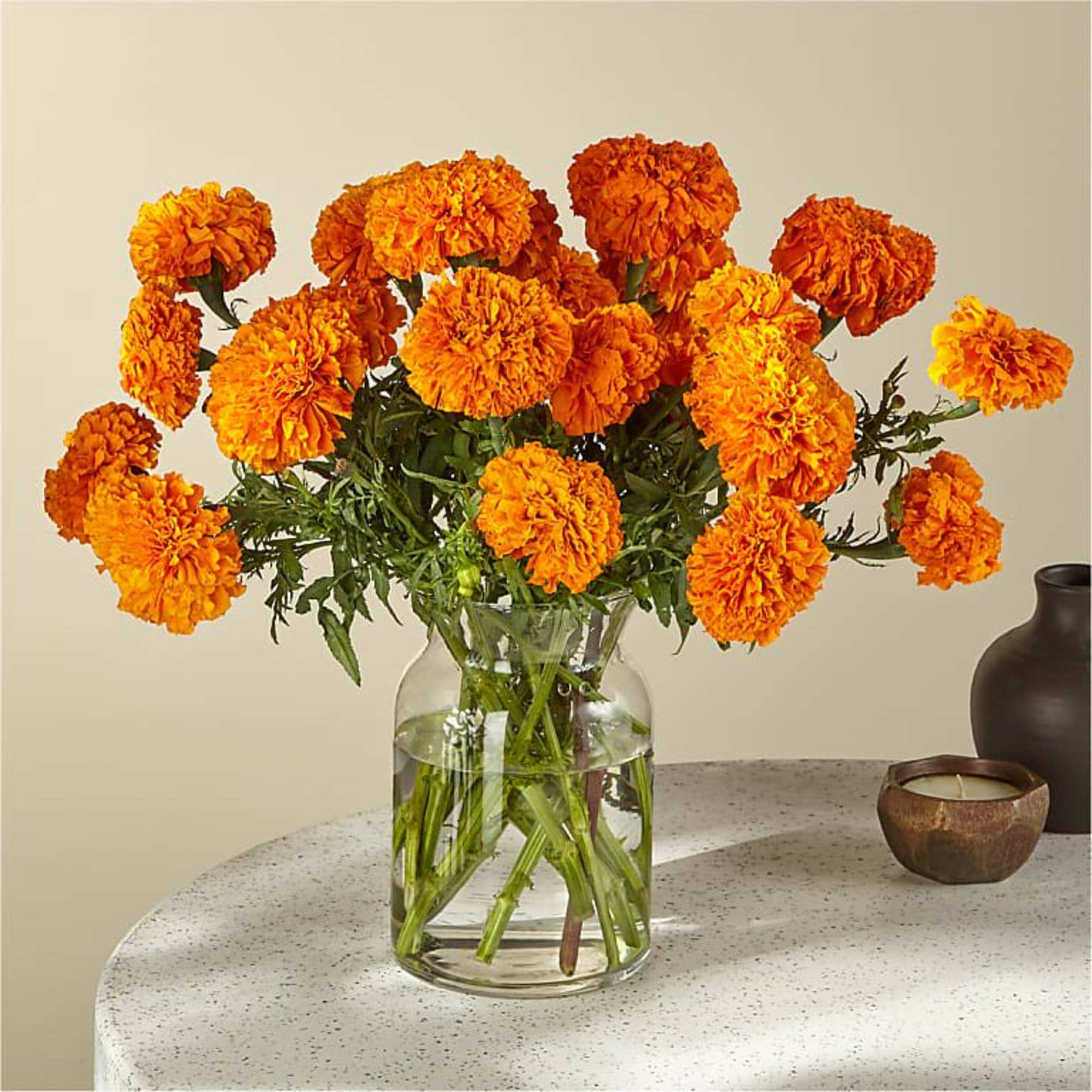 Sublimely orange and long-lasting marigolds bring a subtle frill and ritual to