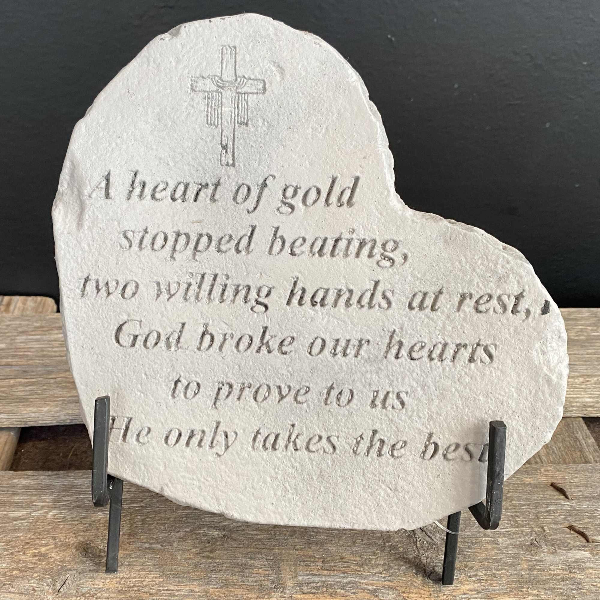 Heart-shaped memorial stone with engraved cross and verse