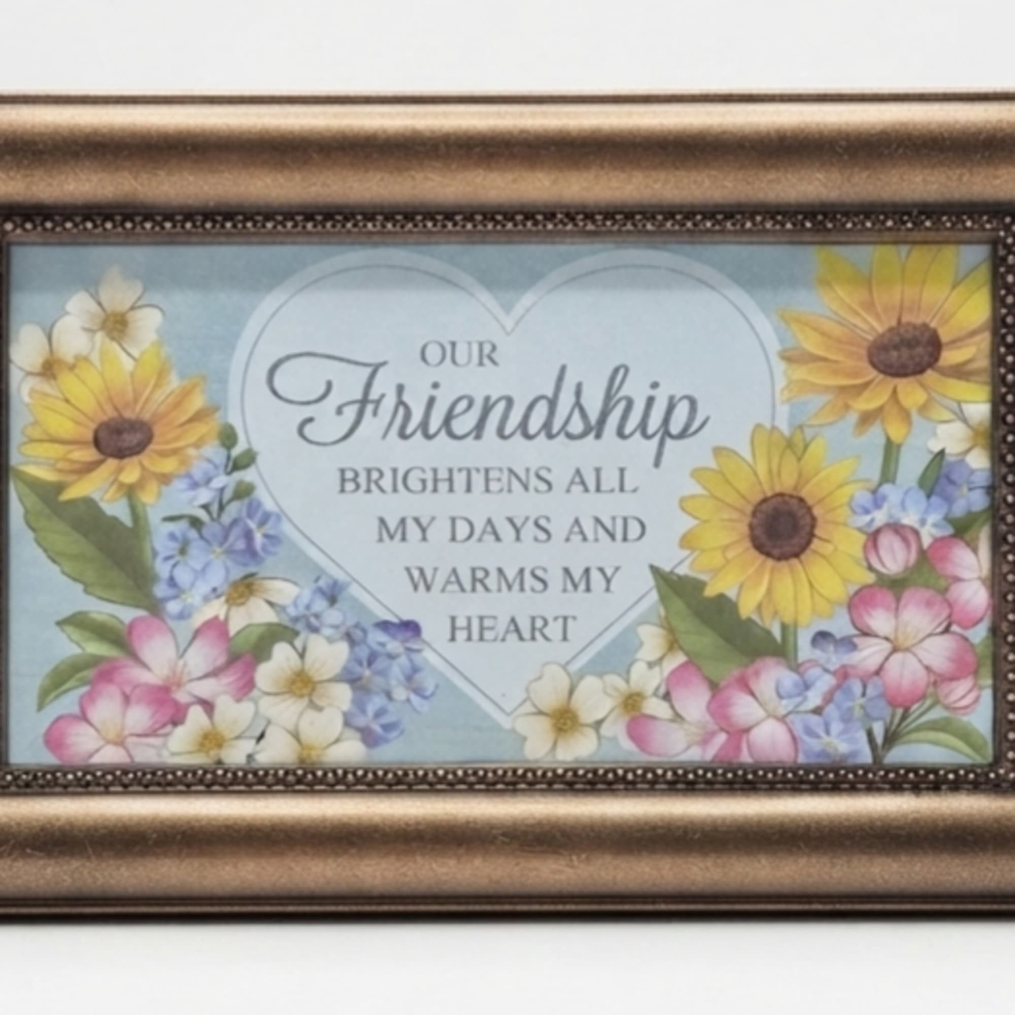 Framed friendship sign with painted flowers and a heart-shaped message