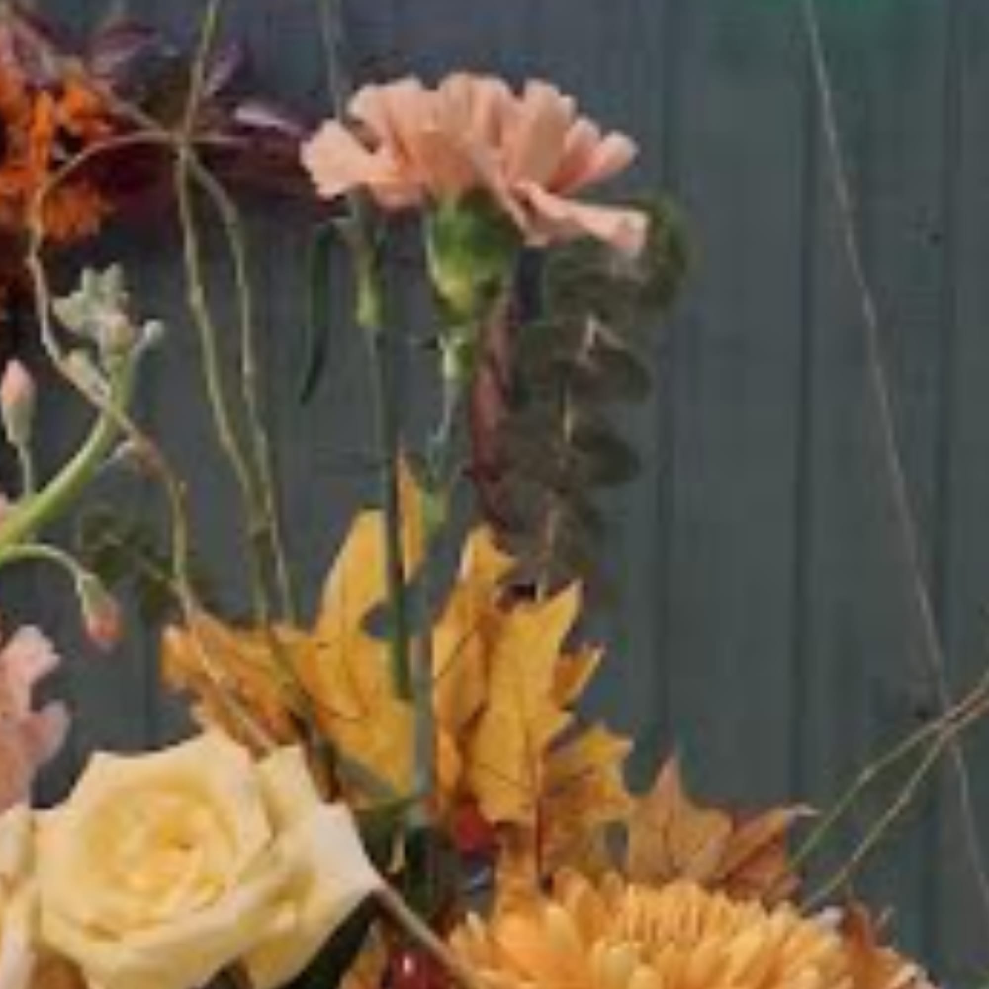 Bouquet with cream roses, peach daisies, and yellow chrysanthemums
