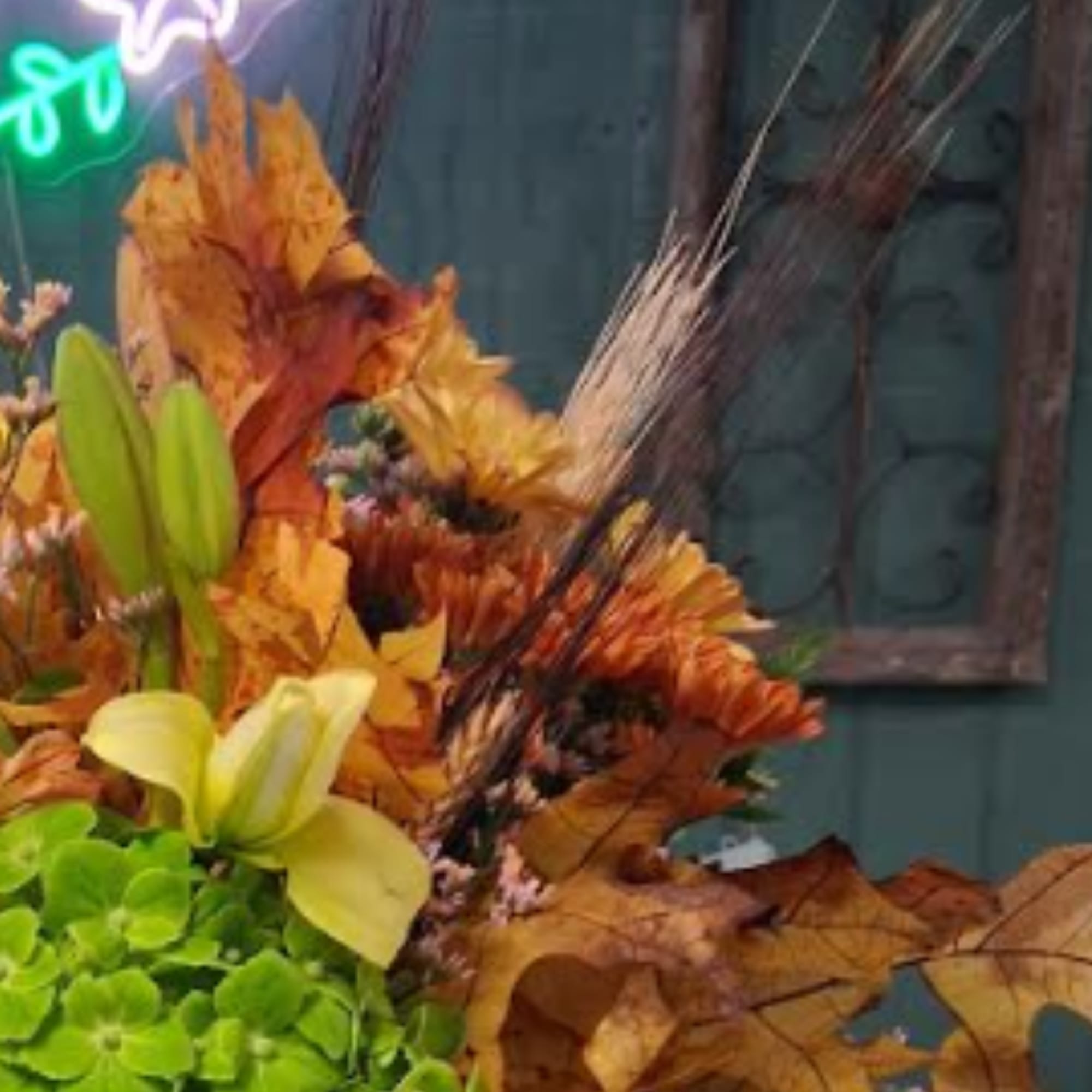 Autumn bouquet with lilies and orange flowers