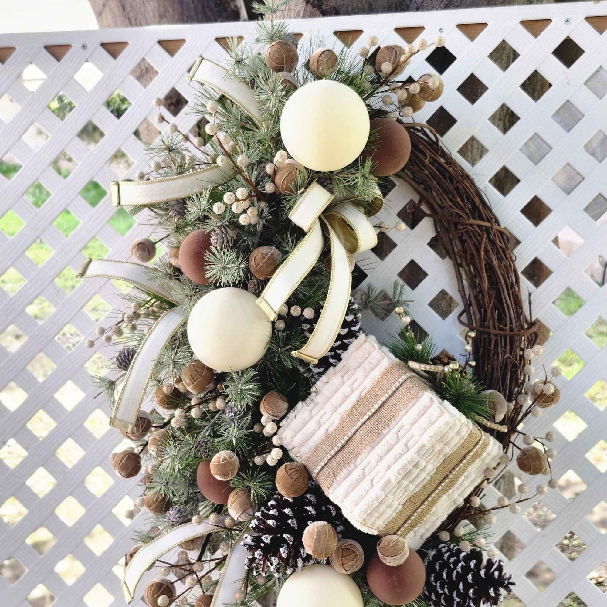 Oblong grapevine wreath with designer ribbon, soft fabric square present, felt ball